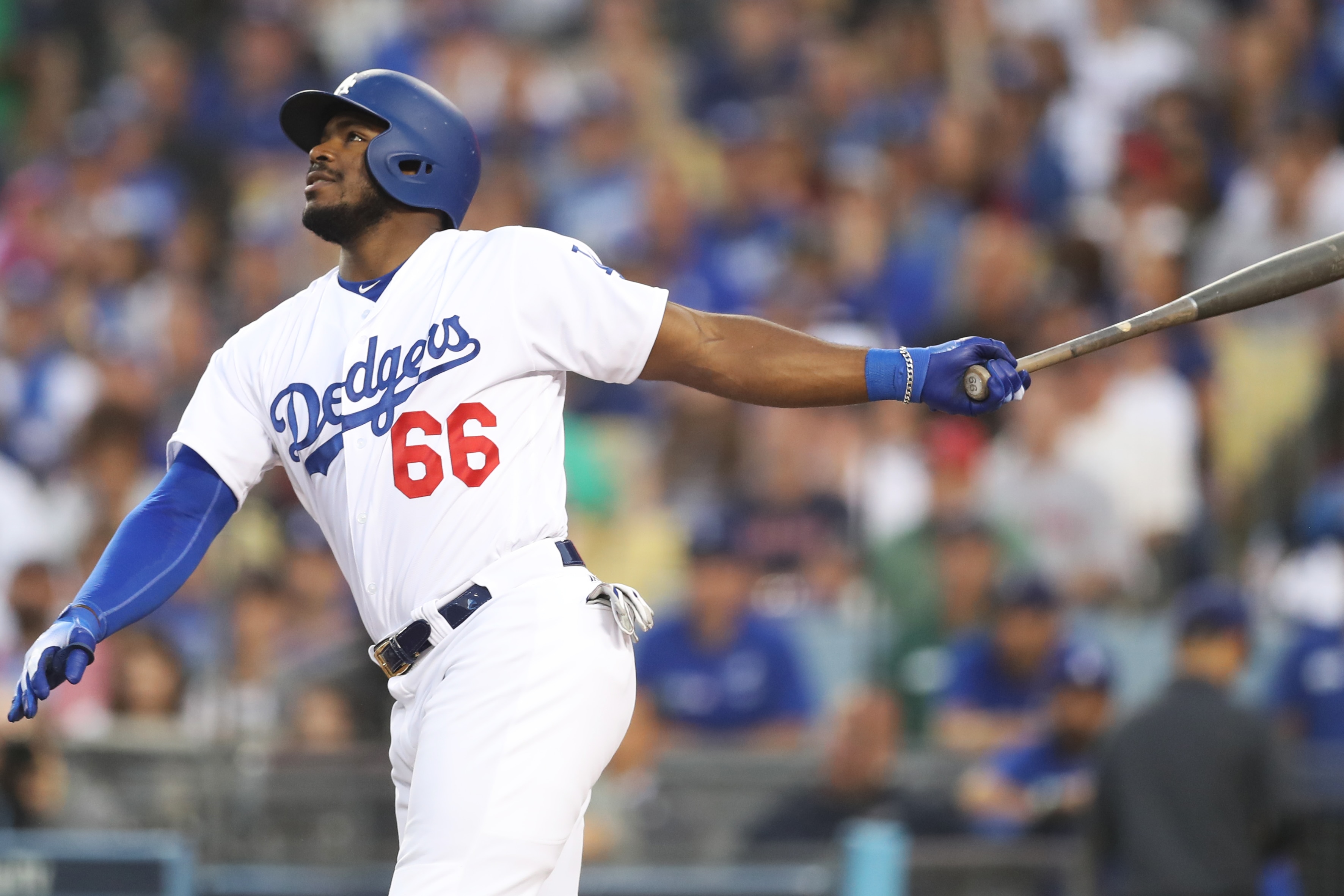 LOS ANGELES, CA - OCTOBER 28: Yasiel Puig #66 of the Los Angeles Dodgers singles in the second inning during Game 5 of the 2018 World Series against the Boston Red Sox at Dodger Stadium on Sunday, October 28, 2018 in Los Angeles, California. (Photo by Rob Tringali/MLB via Getty Images) 