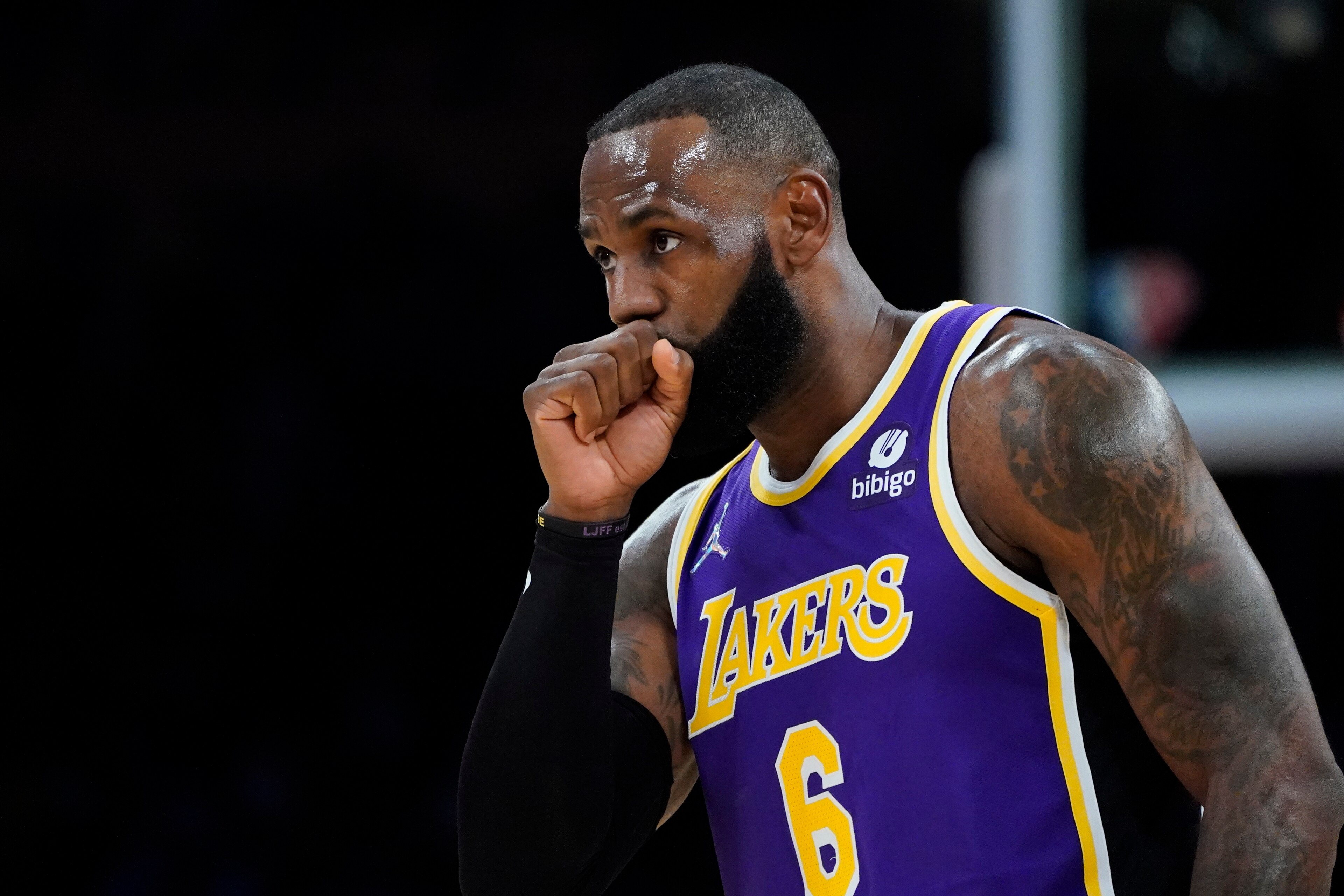 Los Angeles Lakers' LeBron James blows into his fist during the first half of the team's NBA basketball game against the Cleveland Cavaliers on Friday, Oct. 29, 2021, in Los Angeles. (AP Photo/Jae C. Hong) Los Angeles Lakers' LeBron James blows into his fist during the first half of the team's NBA basketball game against the Cleveland Cavaliers on Friday, Oct. 29, 2021, in Los Angeles. (AP Photo/Jae C. Hong)