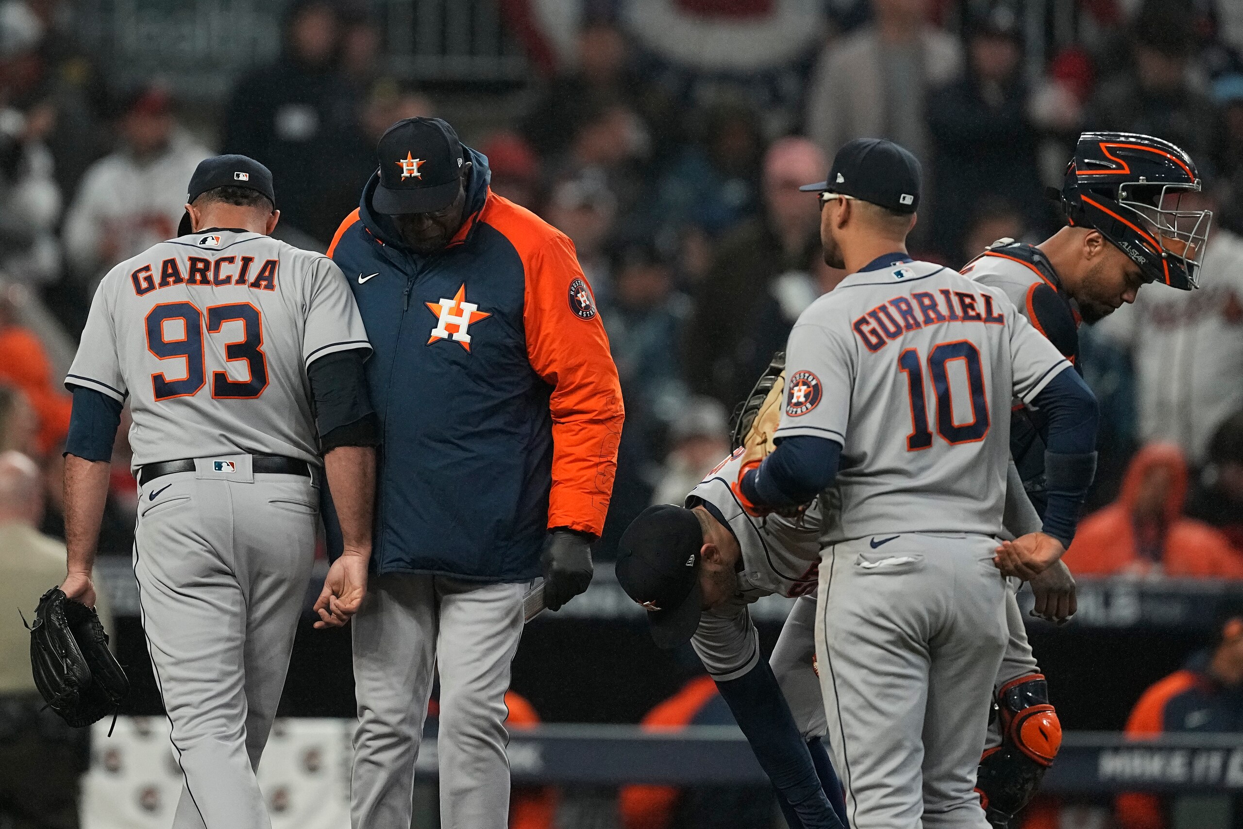 Houston Astros manager Dusty Baker Jr. takes relief pitcher Yimi Garcia out of the game during the sixth inning in Game 3 of baseball's World Series between the Houston Astros and the Atlanta Braves Friday, Oct. 29, 2021, in Atlanta. (AP Photo/Brynn Anderson)