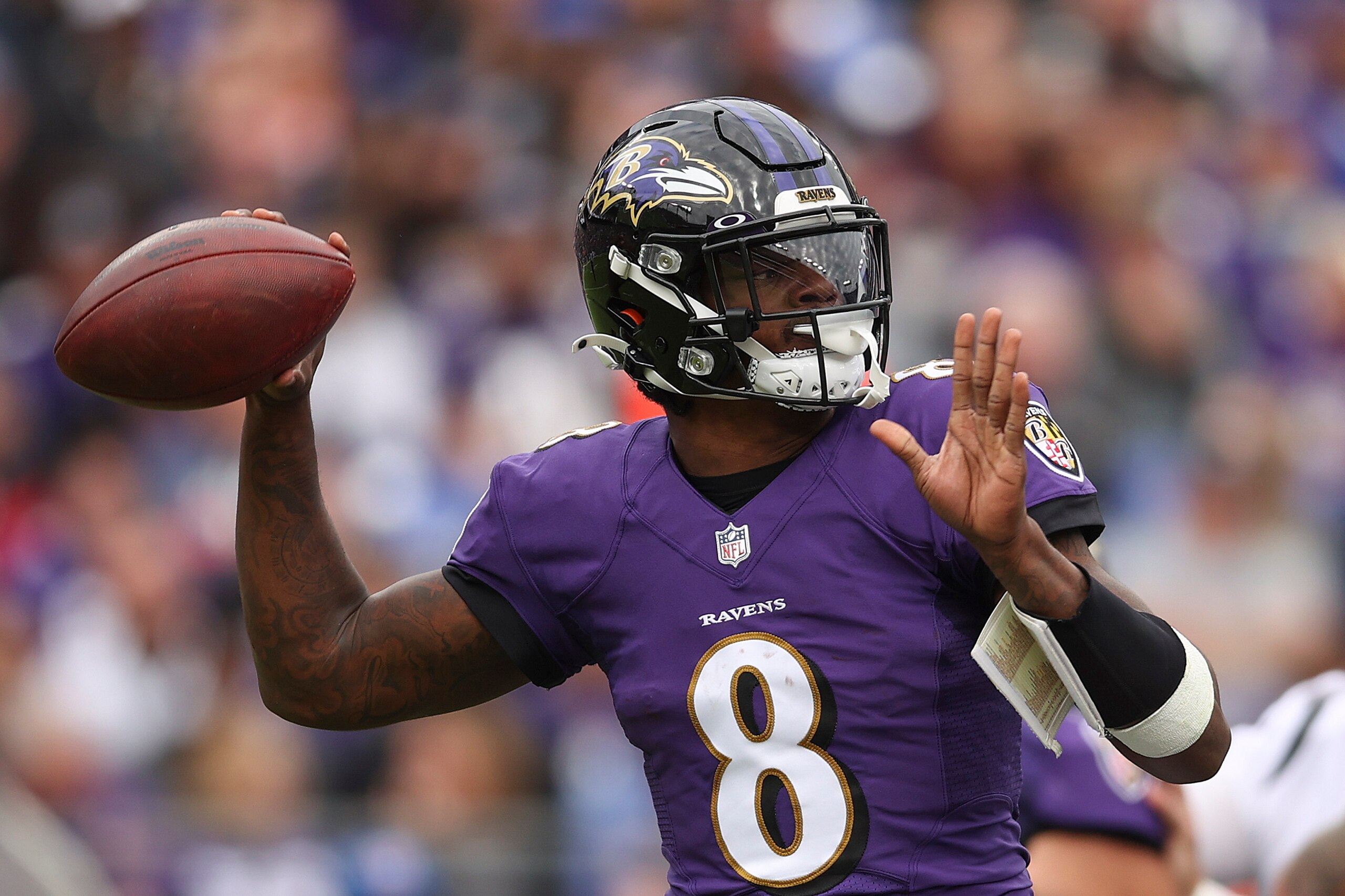 BALTIMORE, MARYLAND - OCTOBER 24: Lamar Jackson #8 of the Baltimore Ravens throws the ball during the first half in the game against the Cincinnati Bengals at M&T Bank Stadium on October 24, 2021 in Baltimore, Maryland. (Photo by Patrick Smith/Getty Images) BALTIMORE, MARYLAND - OCTOBER 24: Lamar Jackson #8 of the Baltimore Ravens throws the ball during the first half in the game against the Cincinnati Bengals at M&T Bank Stadium on October 24, 2021 in Baltimore, Maryland. (Photo by Patrick Smith/Getty Images)