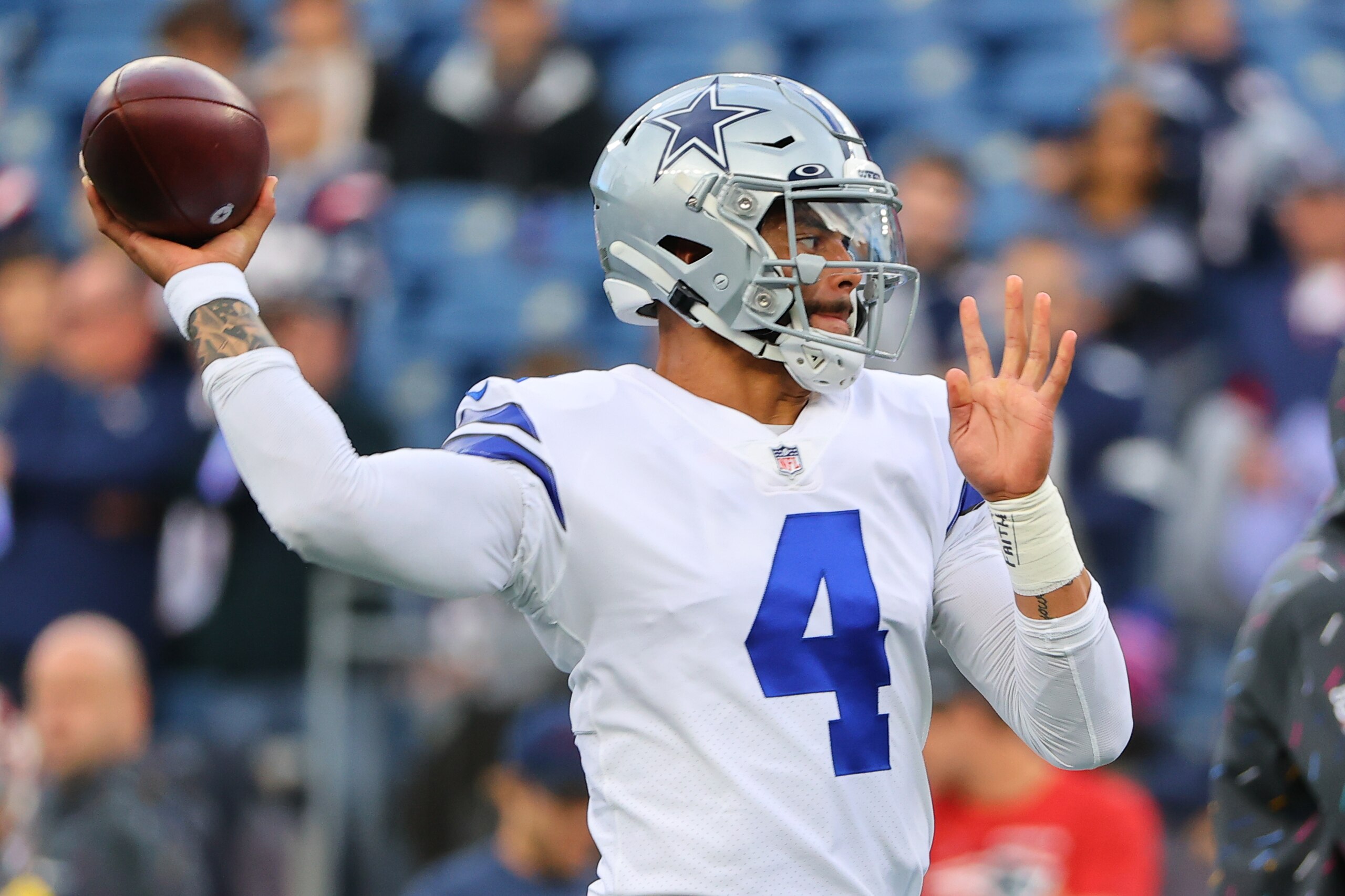 FOXBOROUGH, MA - OCTOBER 17:  Dallas Cowboys quarterback Dak Prescott (4) warms up prior to the National Football League game between the New England Patriots and the Dallas Cowboys on October 17, 2021 at Gillette Stadium in Foxborough, MA.    (Photo by Rich Graessle/Icon Sportswire via Getty Images)