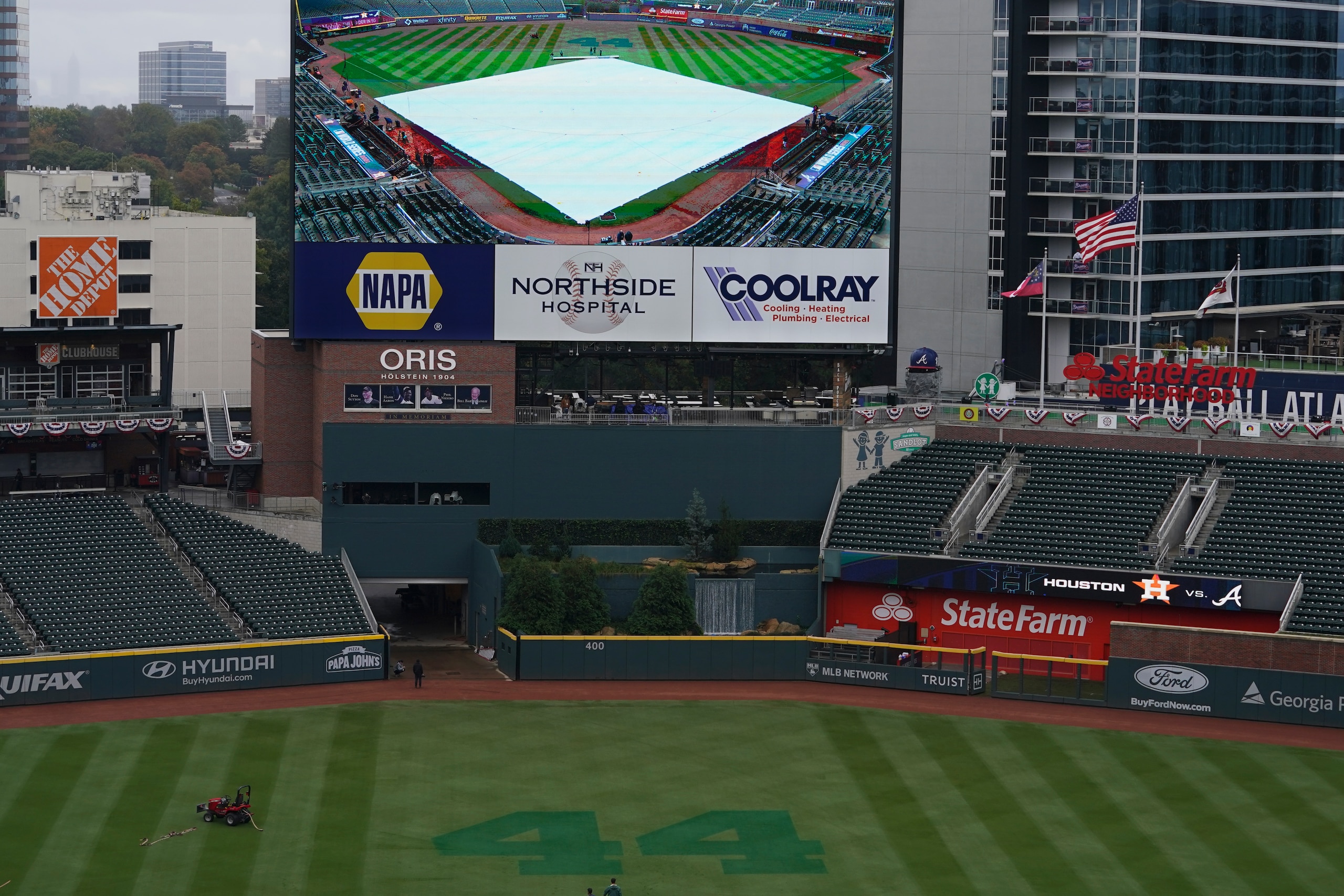 Hank Aaron's No. 44 is etched on the outfield grass at Truist Park before Game 3 of baseball's World Series between the Houston Astros and the Atlanta Braves Friday, Oct. 29, 2021, in Atlanta. The legacy of the late Braves Hall of Famer is stamped all over this matchup between Atlanta and the Houston Astros. (AP Photo/Brynn Anderson)