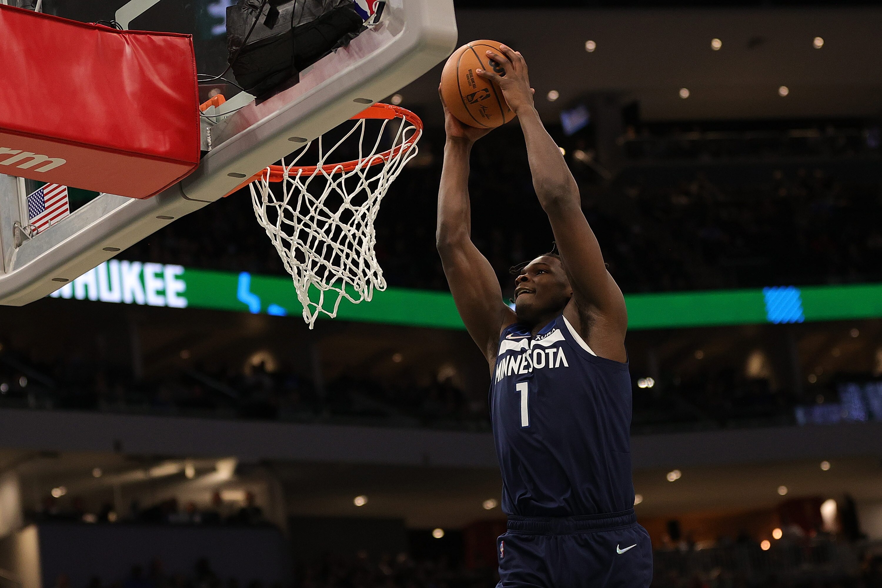 MILWAUKEE, WISCONSIN - OCTOBER 27: Anthony Edwards #1 of the Minnesota Timberwolves dunks during a game against the Milwaukee Bucks at Fiserv Forum on October 27, 2021 in Milwaukee, Wisconsin.  NOTE TO USER: User expressly acknowledges and agrees that, by downloading and or using this photograph, User is consenting to the terms and conditions of the Getty Images License Agreement. (Photo by Stacy Revere/Getty Images)