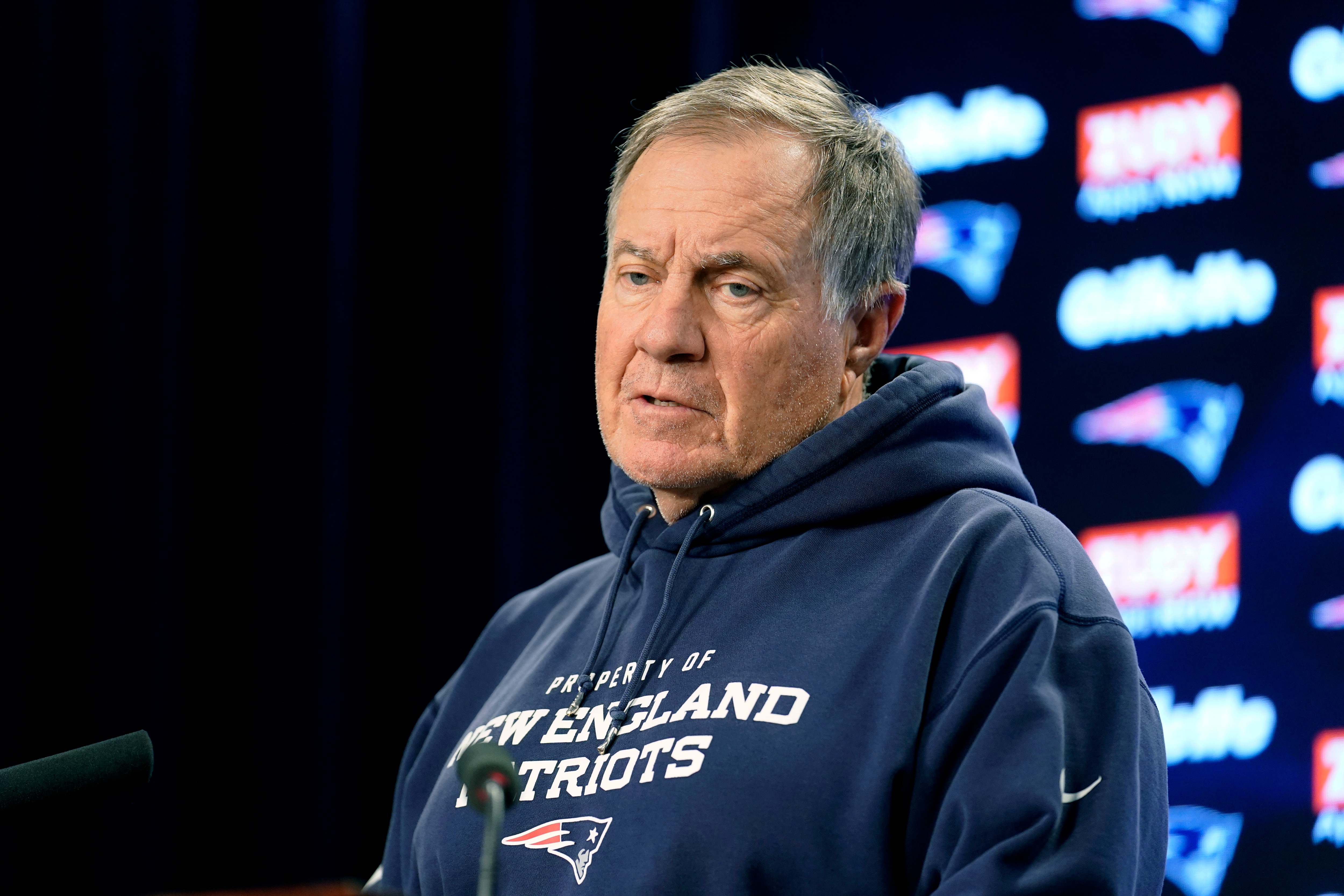 New England Patriots head coach Bill Belichick faces reporters before an NFL football practice, Wednesday, Oct. 27, 2021, in Foxborough, Mass. (AP Photo/Steven Senne)