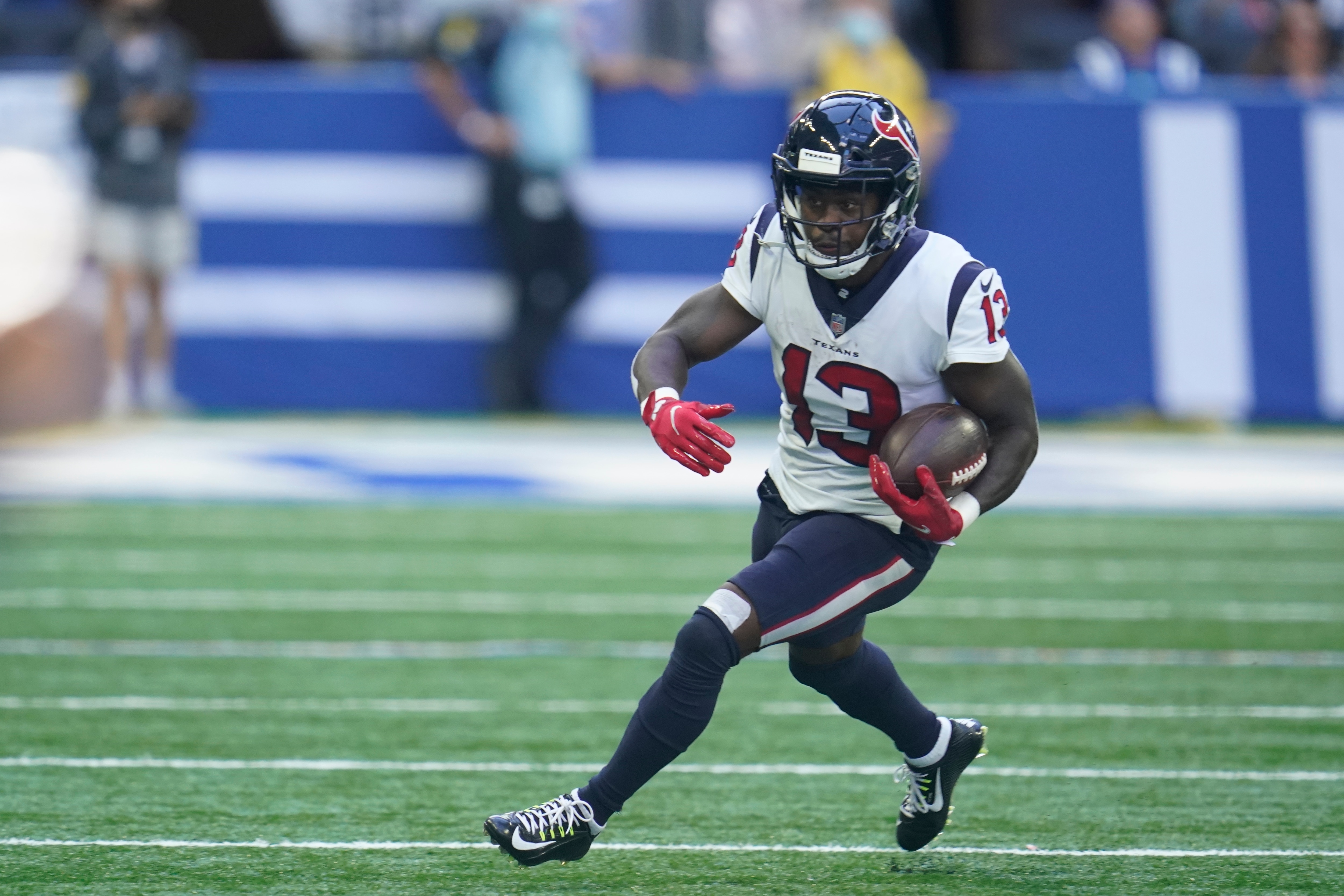 Houston Texans' Brandin Cooks (13) runs during the first half of an NFL football game against the Indianapolis Colts, Sunday, Oct. 17, 2021, in Indianapolis. (AP Photo/Michael Conroy)