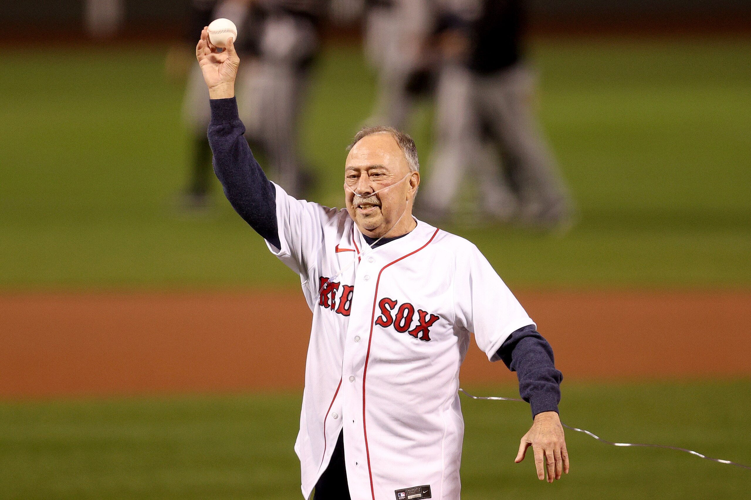 BOSTON, MASSACHUSETTS - OCTOBER 05: Jerry Remy, Hall of Famer and Boston Red Sox broadcaster, throws the ceremonial first pitch during the American League Wild Card game against the New York Yankees at Fenway Park on October 05, 2021 in Boston, Massachusetts. (Photo by Maddie Meyer/Getty Images)