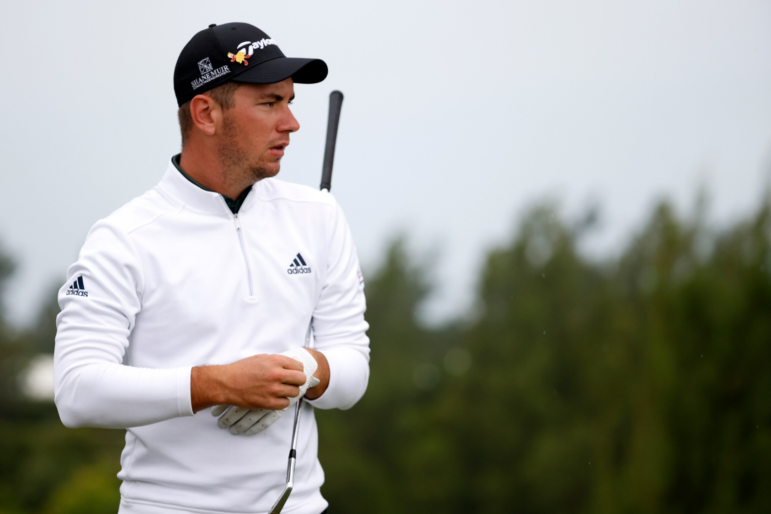SOUTHAMPTON, BERMUDA - OCTOBER 31: Lucas Herbert of Australia walks off the first tee during the final round of the Butterfield Bermuda Championship at Port Royal Golf Course on October 31, 2021 in Southampton, Bermuda. (Photo by Cliff Hawkins/Getty Images)