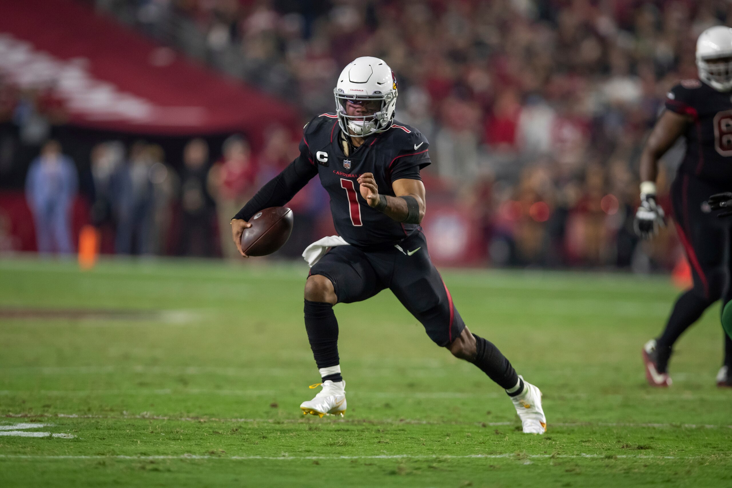 Quarterback (1) Kyler Murray of the Arizona Cardinals runs the ball against the Green Bay Packers in an NFL football game, Thursday, Oct. 28, 2021, in Glendale, Ariz. The Packers won 24-21.(AP Photo/Jeff Lewis)