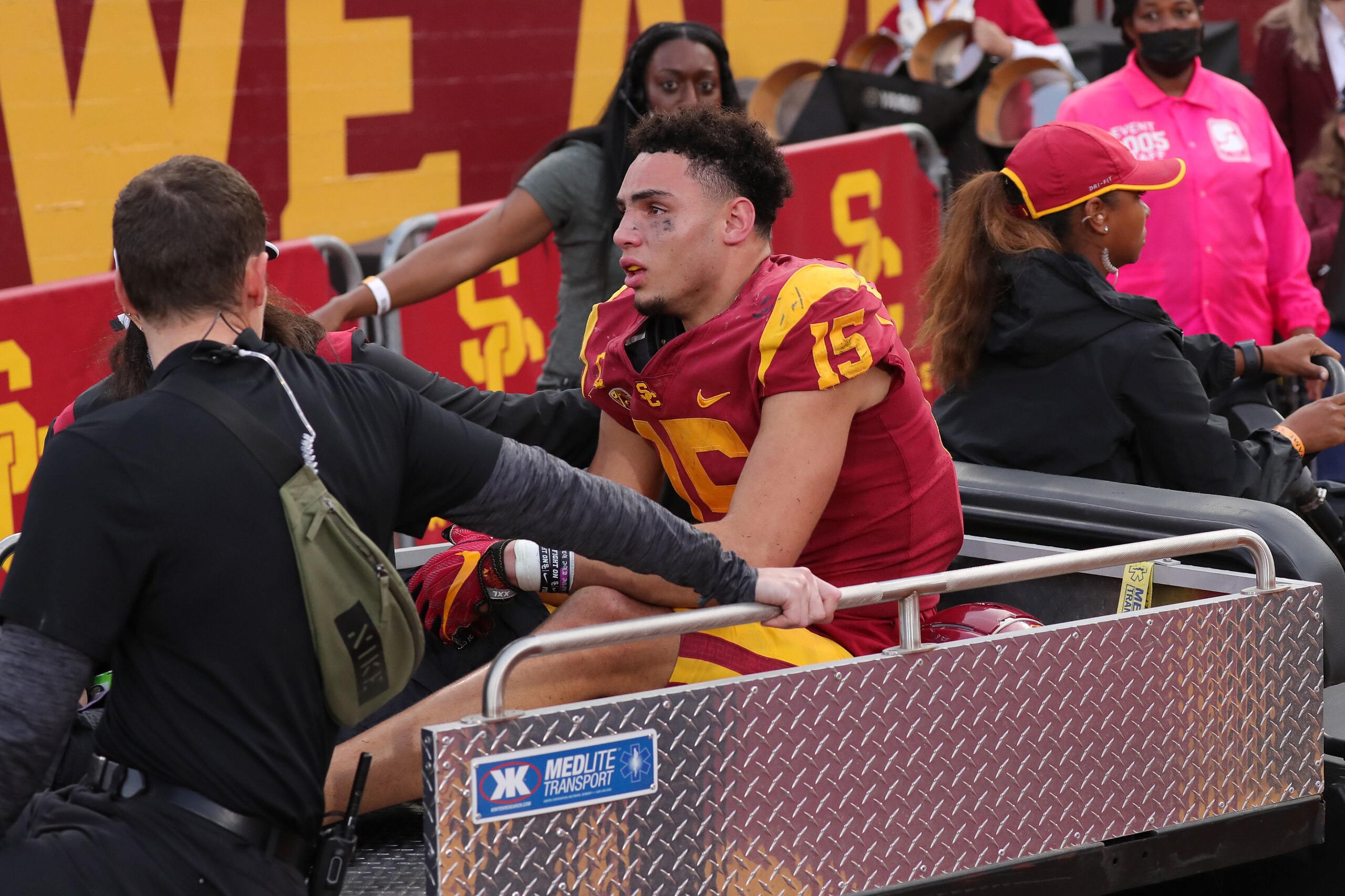 LOS ANGELES, CALIFORNIA - OCTOBER 30: Wide receiver Drake London #15 of the USC gets carted off the field after injuring his ankle in first half against the Arizona Wildcats during a college football game between the Arizona Wildcats and the USC Trojans at Los Angeles Memorial Coliseum on October 30, 2021 in Los Angeles, California. (Photo by Leon Bennett/Getty Images)