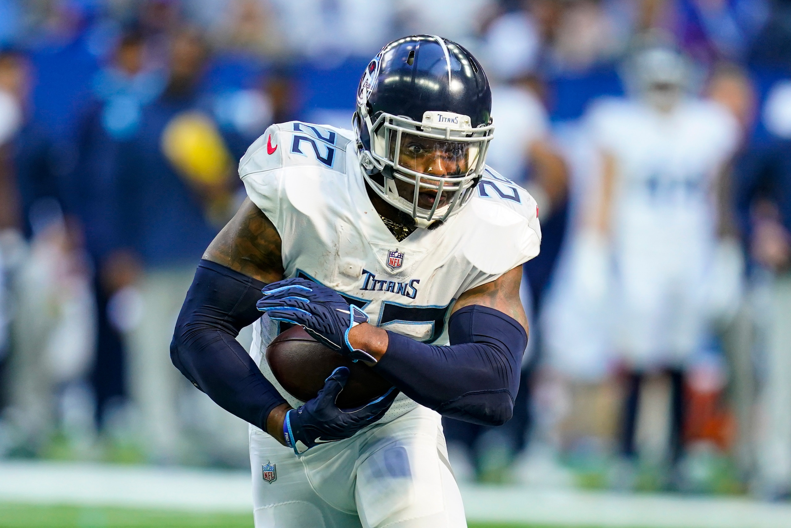 Tennessee Titans running back Derrick Henry (22) runs against the Indianapolis Colts in the second half of an NFL football game in Indianapolis, Sunday, Oct. 31, 2021. (AP Photo/Darron Cummings)