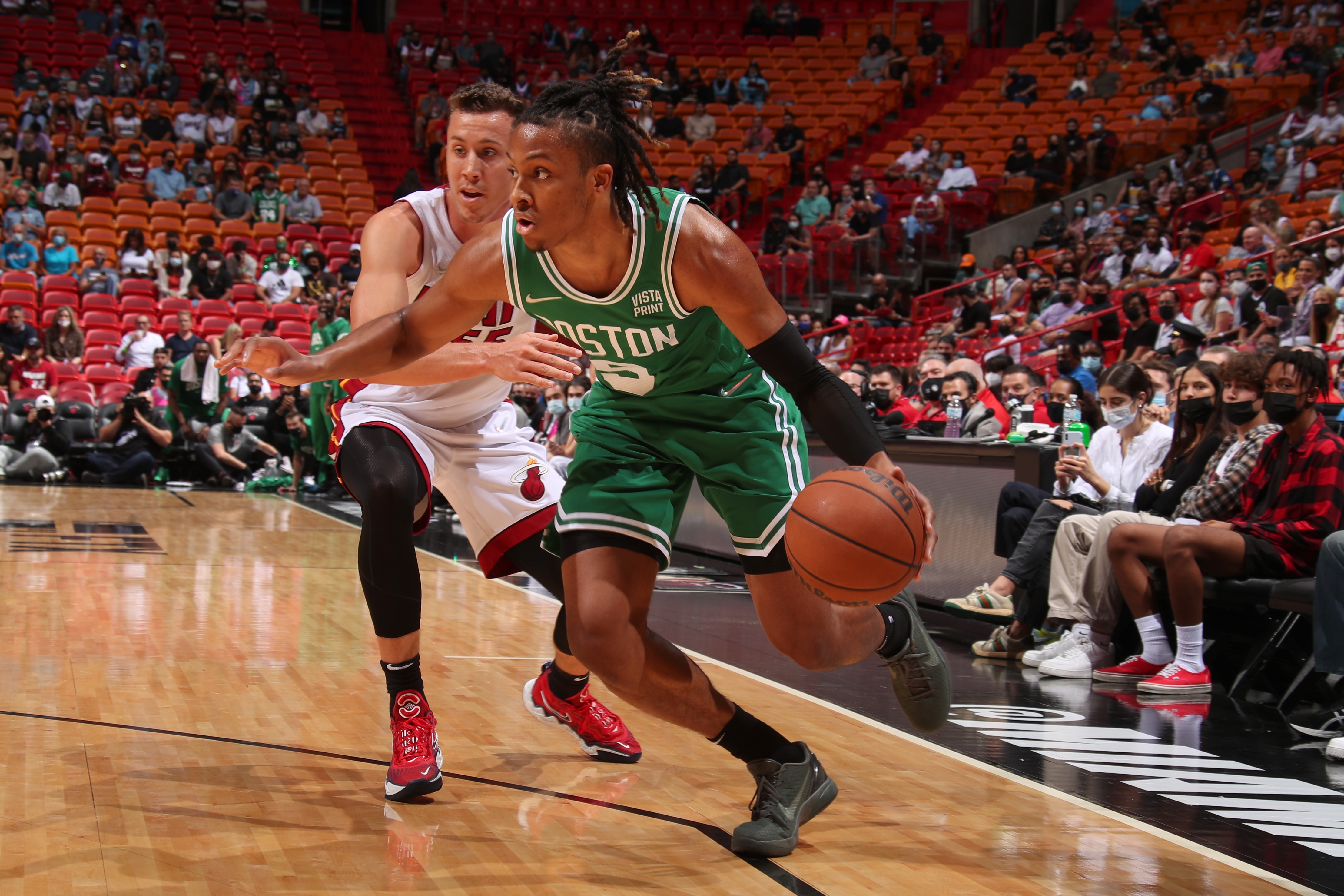 MIAMI, FL - OCTOBER 15: Romeo Langford #9 of the Boston Celtics drives to the basket during a preseason game against the Miami Heat on October 15, 2021 at FTX Arena in Miami, Florida. NOTE TO USER: User expressly acknowledges and agrees that, by downloading and or using this Photograph, user is consenting to the terms and conditions of the Getty Images License Agreement. Mandatory Copyright Notice: Copyright 2021 NBAE (Photo by Issac Baldizon/NBAE via Getty Images)