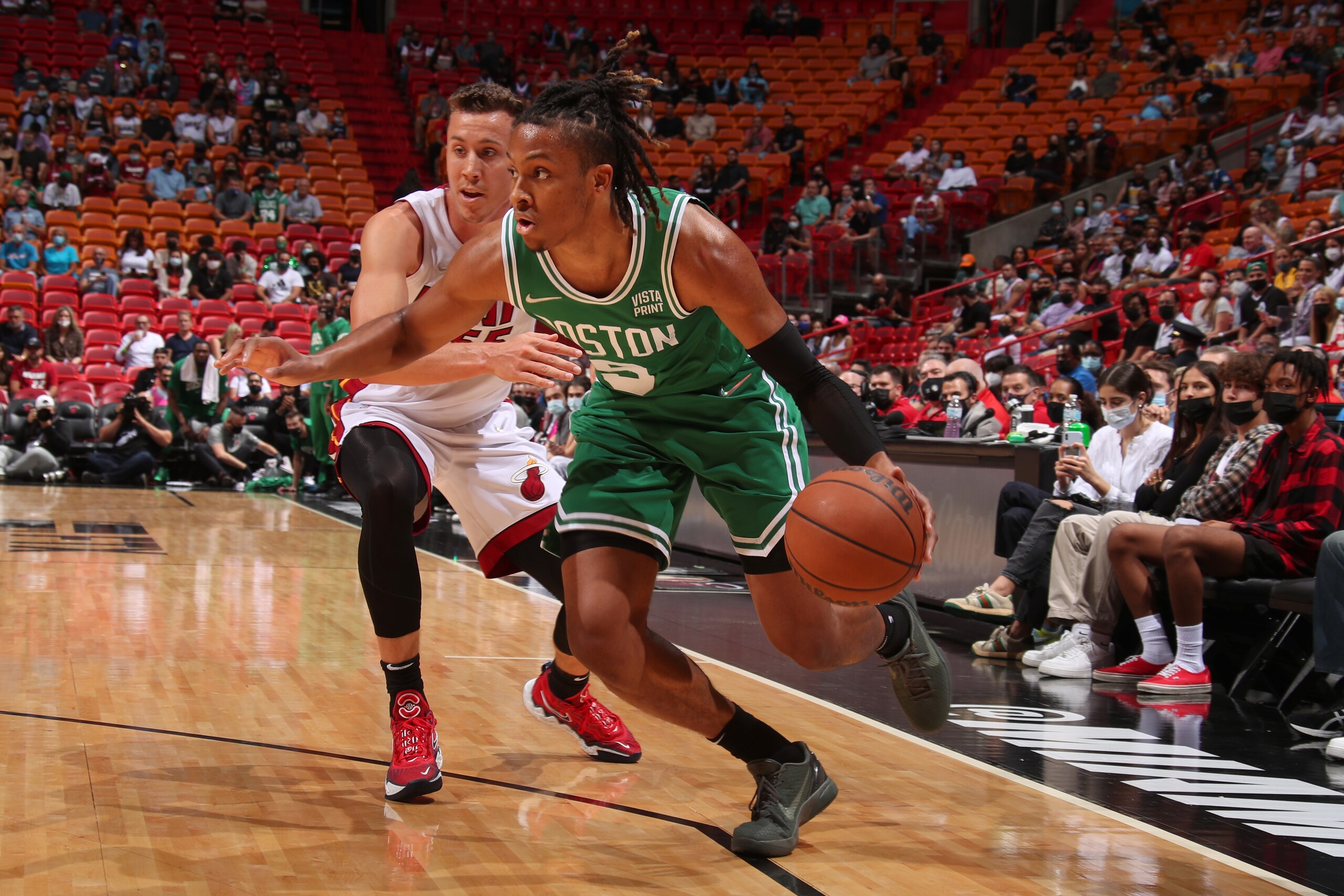 MIAMI, FL - OCTOBER 15: Romeo Langford #9 of the Boston Celtics drives to the basket during a preseason game against the Miami Heat on October 15, 2021 at FTX Arena in Miami, Florida. NOTE TO USER: User expressly acknowledges and agrees that, by downloading and or using this Photograph, user is consenting to the terms and conditions of the Getty Images License Agreement. Mandatory Copyright Notice: Copyright 2021 NBAE (Photo by Issac Baldizon/NBAE via Getty Images)