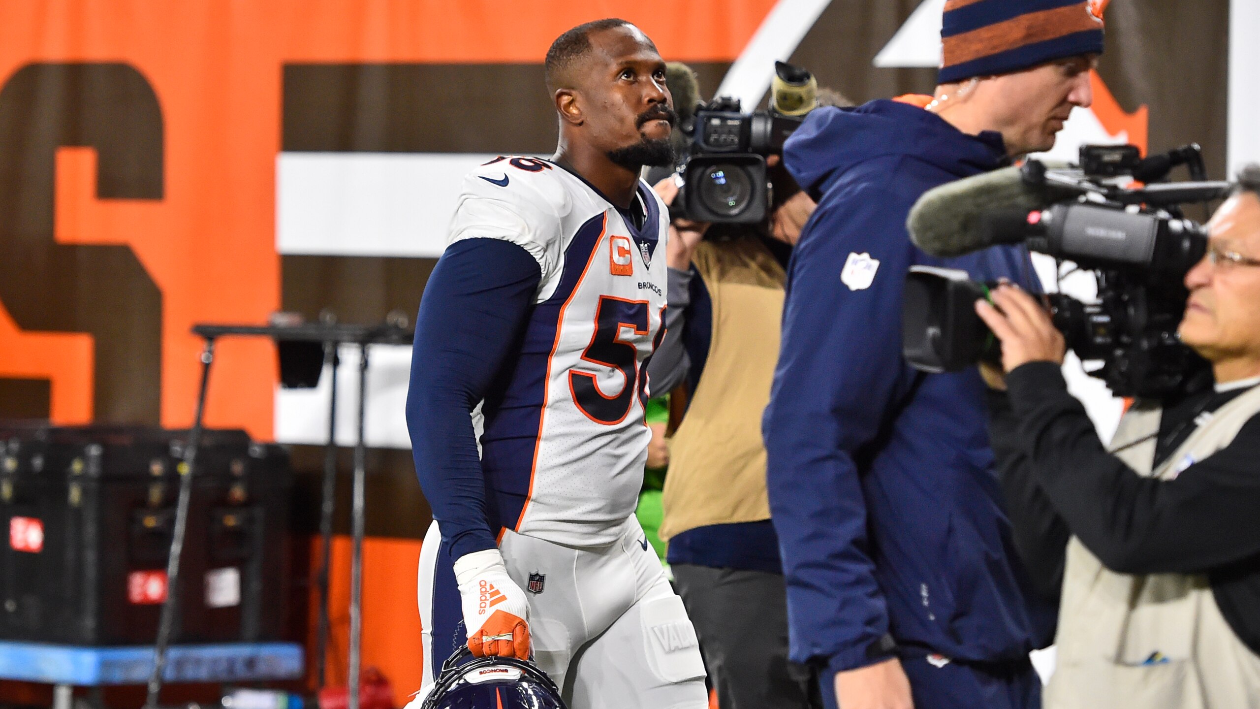 Denver Broncos outside linebacker Von Miller walks off the field after an injury during the first half of the team's NFL football game against the Cleveland Browns, Thursday, Oct. 21, 2021, in Cleveland. (AP Photo/David Richard) Denver Broncos outside linebacker Von Miller walks off the field after an injury during the first half of the team's NFL football game against the Cleveland Browns, Thursday, Oct. 21, 2021, in Cleveland. (AP Photo/David Richard)
