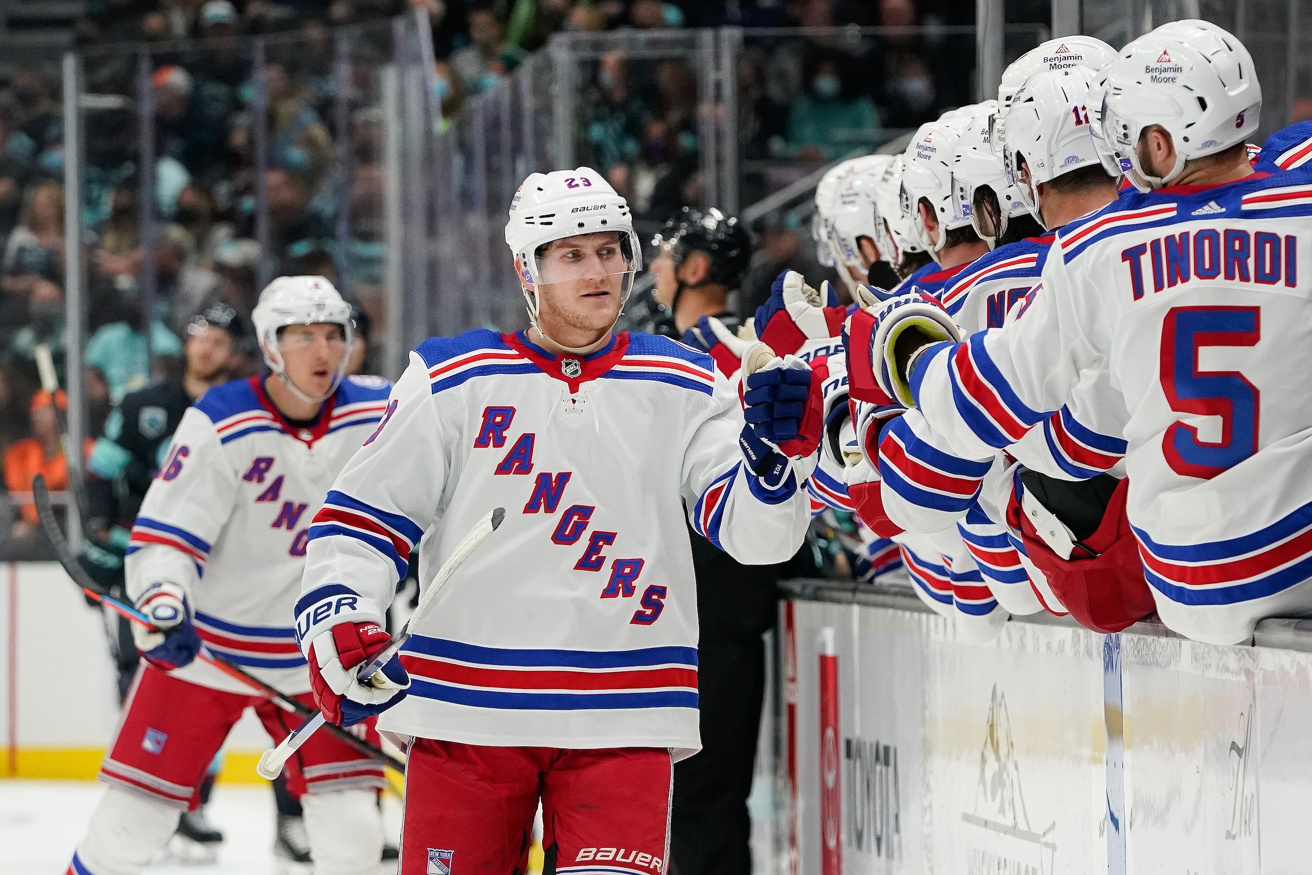 SEATTLE, WASHINGTON - OCTOBER 31: Adam Fox #23 of the New York Rangers celebrates with teammates after scoring a goal against the Seattle Kraken to take a 2-1 lead during the third period at Climate Pledge Arena on October 31, 2021 in Seattle, Washington.  (Photo by Christopher Mast/NHLI via Getty Images)