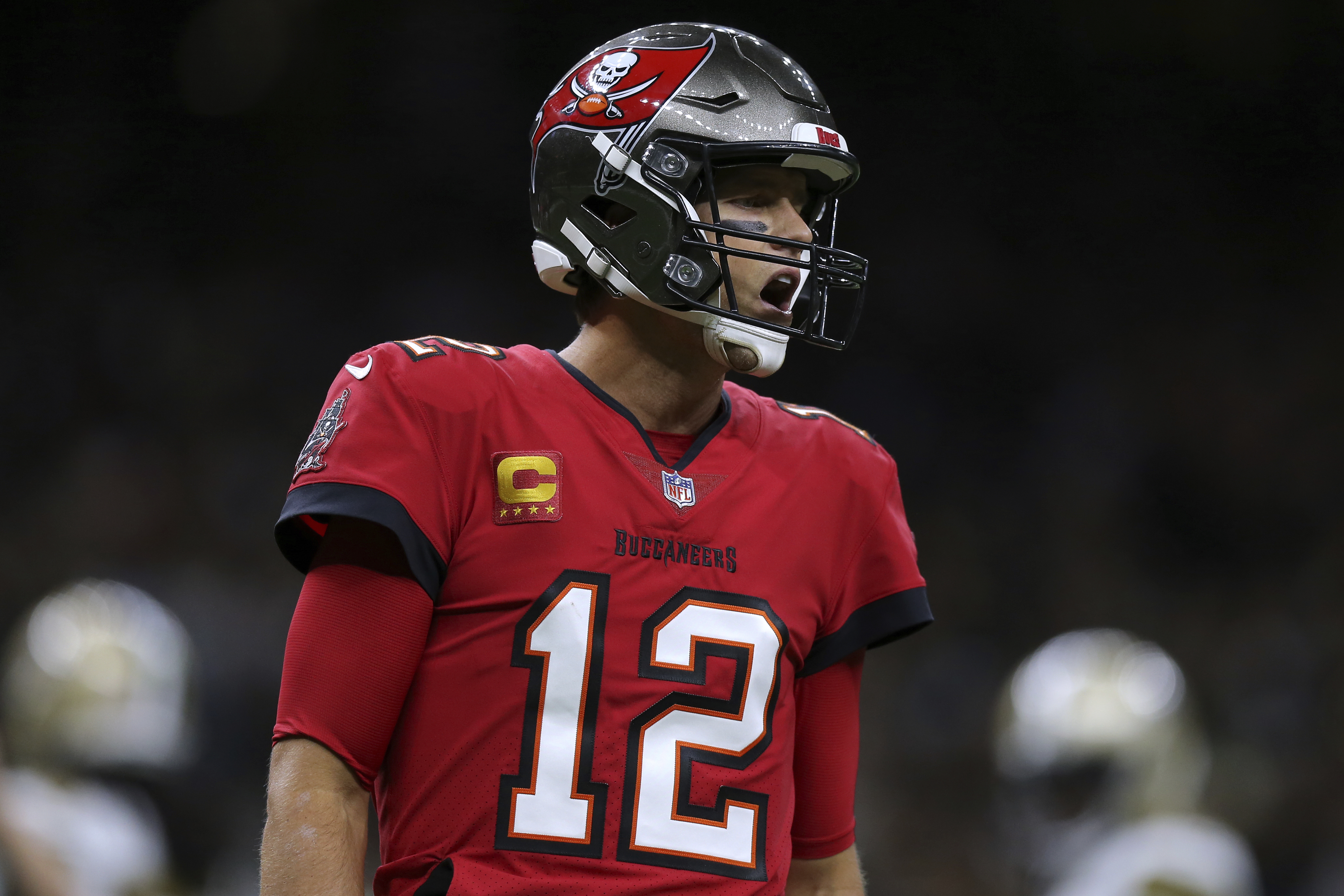 Tampa Bay Buccaneers quarterback Tom Brady (12) reacts during the first half of an NFL football game against the New Orleans Saints, Sunday, Oct. 31, 2021, in New Orleans. (AP Photo/Jonathan Bachman)