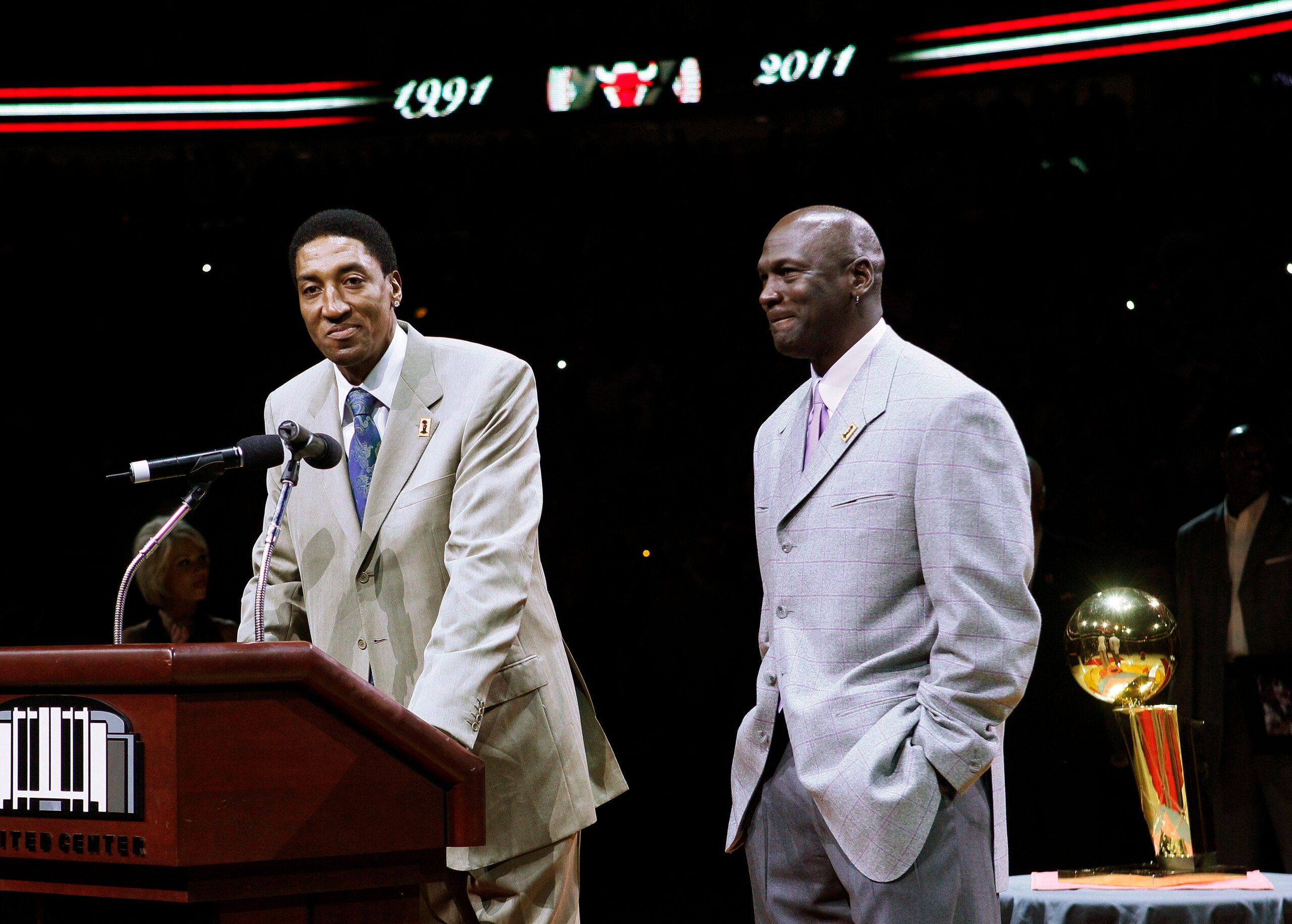 FILE - In this March 12, 2011, file photo, former Chicago Bull Scottie Pippen, left, addresses the crowd as Michael Jordan and teammates from their 1990-91 season celebrate the 20th anniversary of the Bulls' first NBA championship, during halftime of an NBA game against the Bulls and Utah Jazz in Chicago. Pippen says he’s talked with Jordan since “The Last Dance” documentary aired in the spring and downplayed any rift between the retired Bulls stars. (AP Photo/Charles Rex Arbogast, File) FILE - In this March 12, 2011, file photo, former Chicago Bull Scottie Pippen, left, addresses the crowd as Michael Jordan and teammates from their 1990-91 season celebrate the 20th anniversary of the Bulls' first NBA championship, during halftime of an NBA game against the Bulls and Utah Jazz in Chicago. Pippen says he’s talked with Jordan since “The Last Dance” documentary aired in the spring and downplayed any rift between the retired Bulls stars. (AP Photo/Charles Rex Arbogast, File)