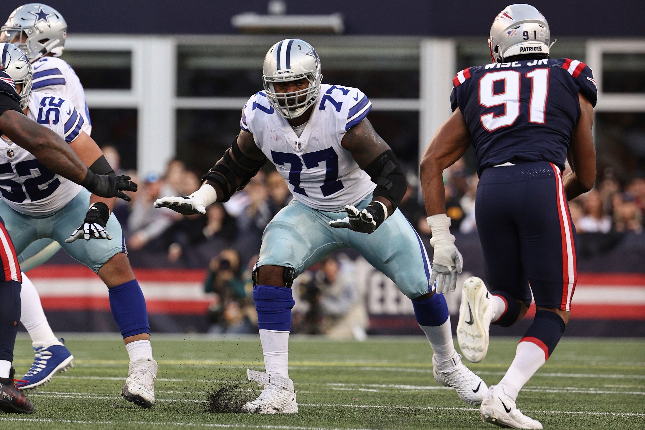 Dallas Cowboys offensive tackle Tyron Smith blocks against the New England Patriots during an NFL football game at Gillette Stadium, Sunday, Oct. 17, 2021 in Foxborough, Mass. (Winslow Townson/AP Images for Panini) Dallas Cowboys offensive tackle Tyron Smith blocks against the New England Patriots during an NFL football game at Gillette Stadium, Sunday, Oct. 17, 2021 in Foxborough, Mass. (Winslow Townson/AP Images for Panini)