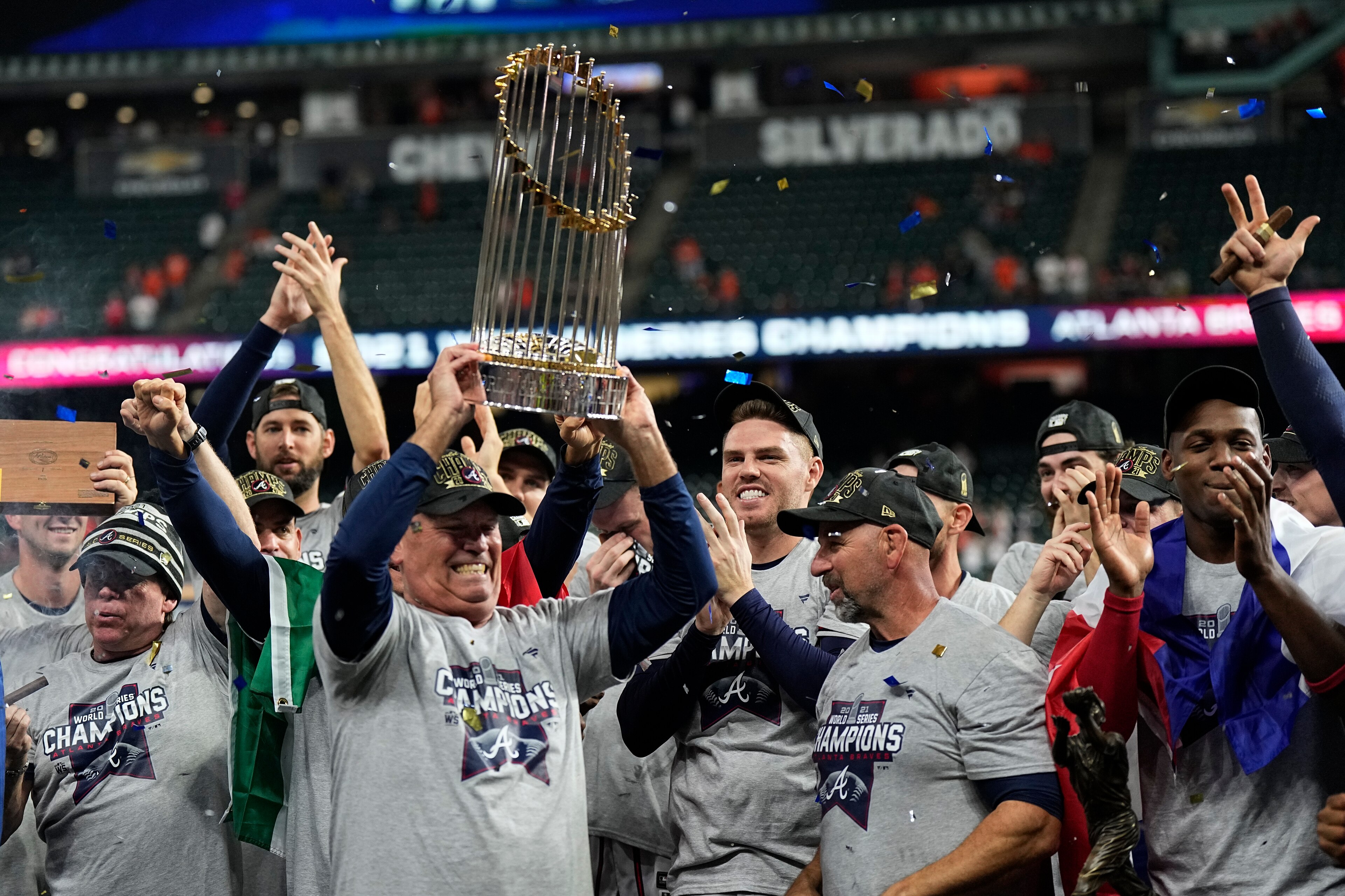 Atlanta Braves manager Brian Snitker holds up the trophy = after winning baseball's World Series in Game 6 against the Houston Astros Tuesday, Nov. 2, 2021, in Houston. The Braves won 7-0. (AP Photo/David J. Phillip) Atlanta Braves manager Brian Snitker holds up the trophy = after winning baseball's World Series in Game 6 against the Houston Astros Tuesday, Nov. 2, 2021, in Houston. The Braves won 7-0. (AP Photo/David J. Phillip)