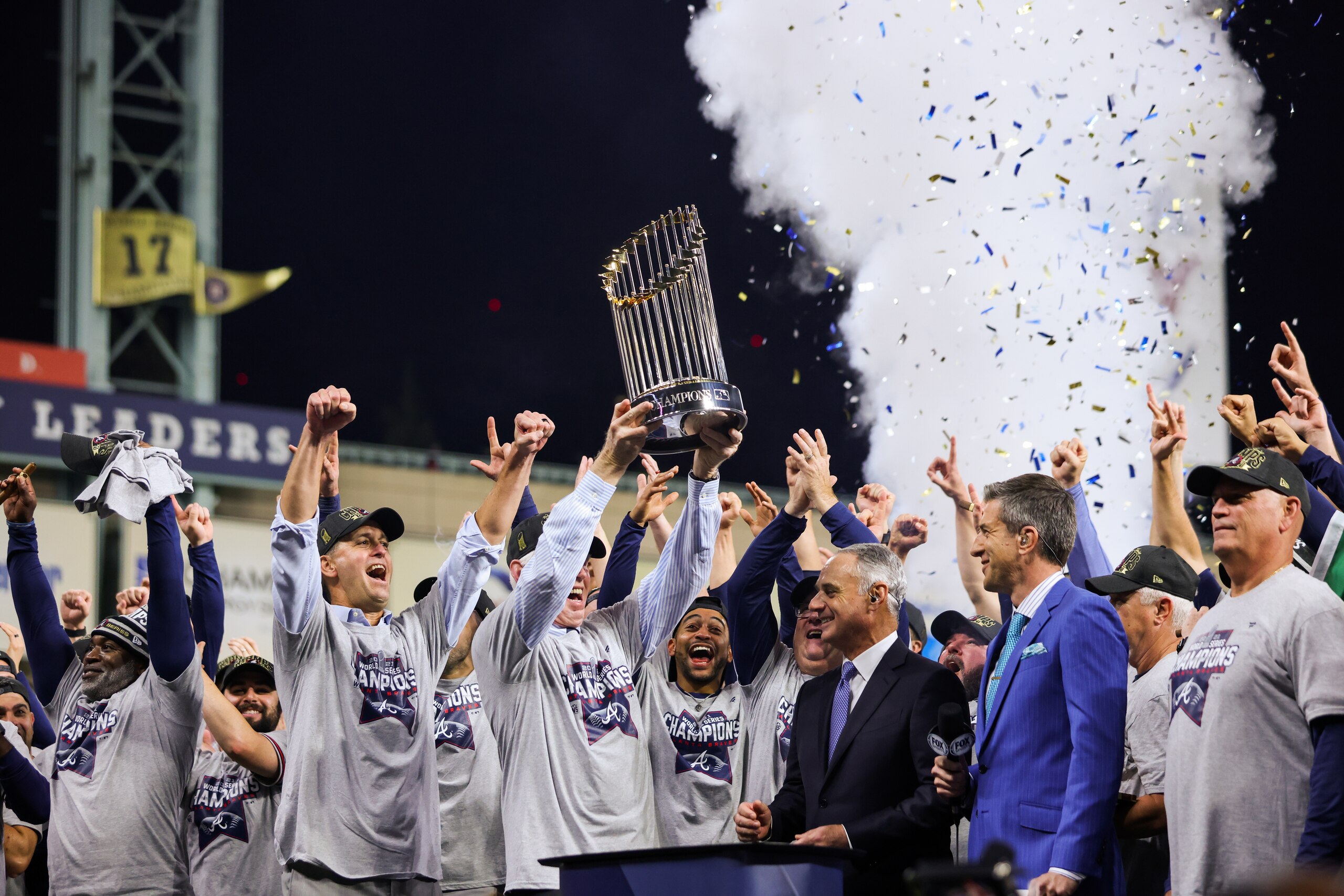 HOUSTON, TX - NOVEMBER 02:  Members of the Atlanta Braves, ownership, staff and commissioner of baseball Robert D. Manfred Jr. celebrate after the Braves beat the Astros, 7-0, in Game 6 of the 2021 World Series between the Atlanta Braves and the Houston Astros at Minute Maid Park on Tuesday, November 2, 2021 in Houston, Texas (Photo by Rob Tringali/MLB Photos via Getty Images)