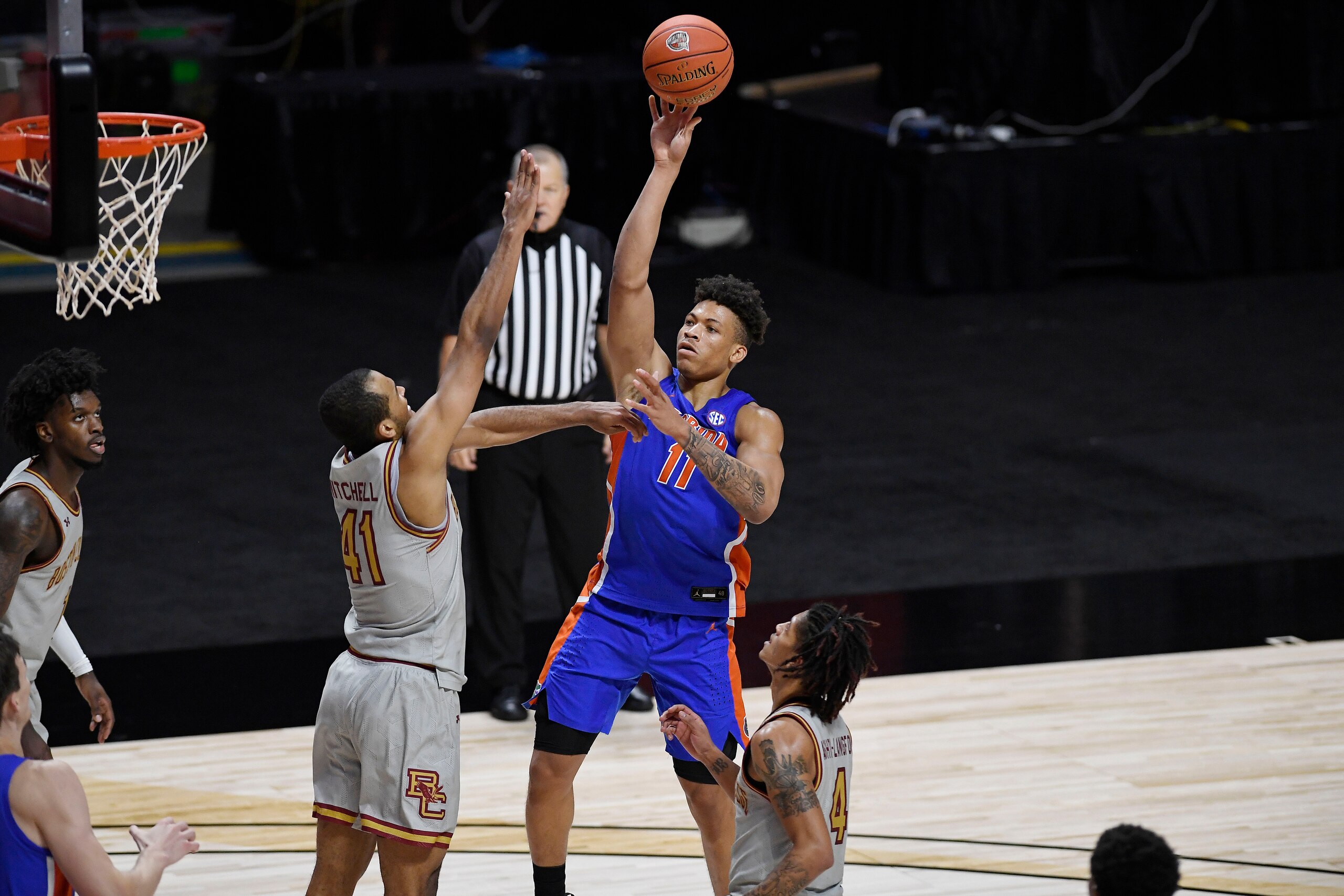 Florida's Keyontae Johnson shoots over Boston College's Steffon Mitchell (41) during the second half of an NCAA college basketball game Thursday, Dec. 3, 2020, in Uncasville, Conn. (AP Photo/Jessica Hill)