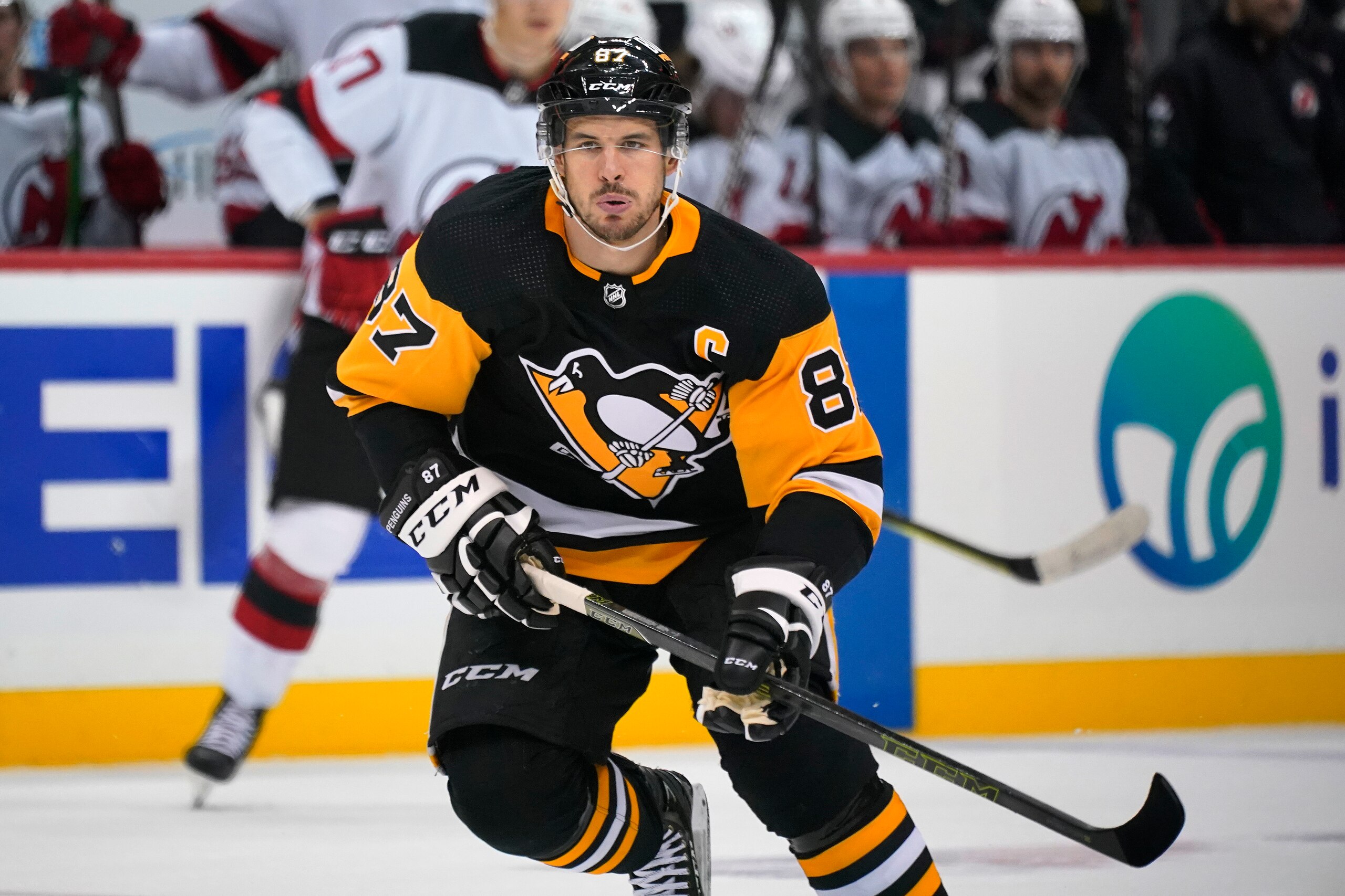 Pittsburgh Penguins' Sidney Crosby (87) skates during the second period of the team's NHL hockey game against the New Jersey Devils in Pittsburgh, Saturday, Oct. 30, 2021. It is Crosby's first game this season, after his recovery from wrist surgery. (AP Photo/Gene J. Puskar)