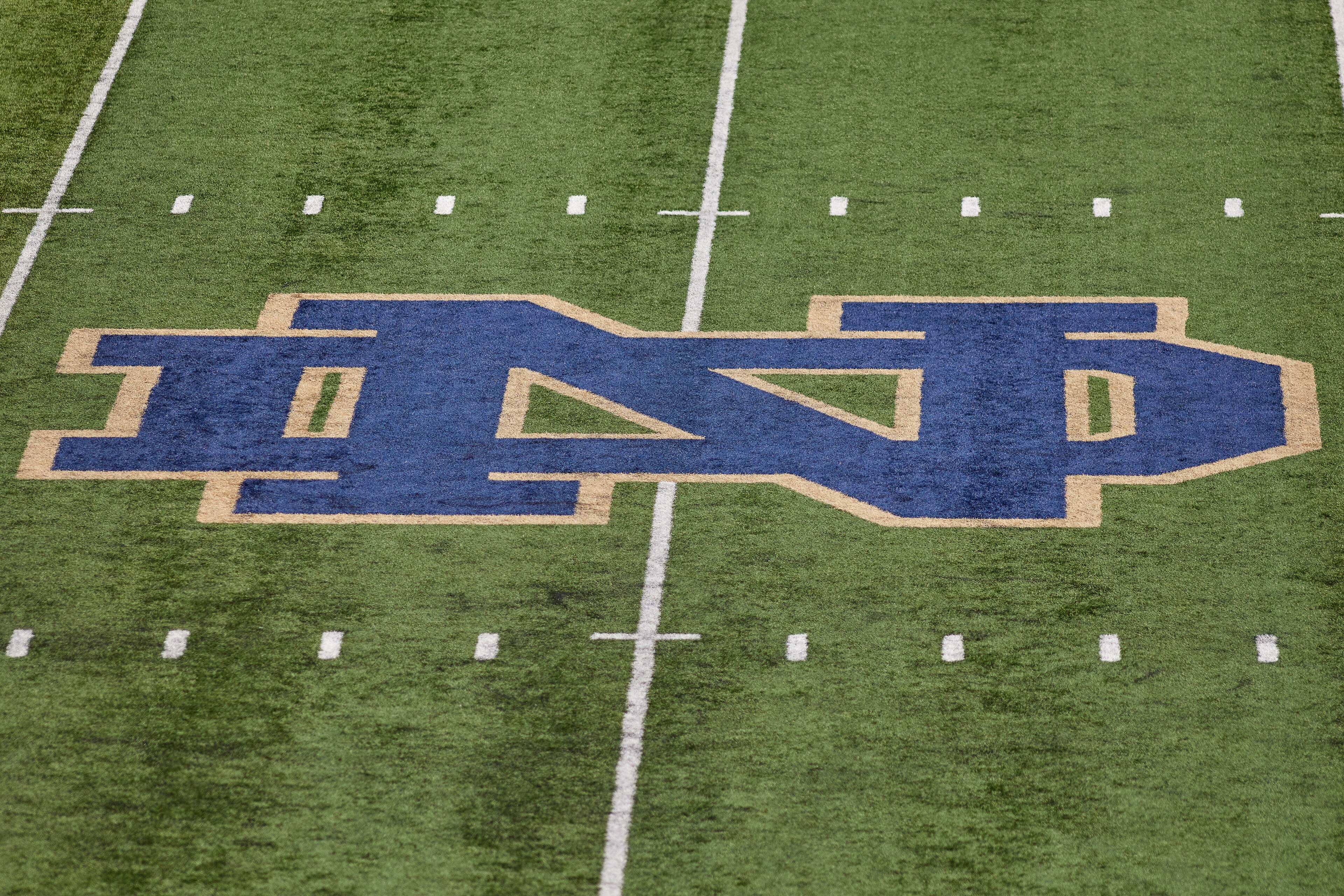 SOUTH BEND, IN - SEPTEMBER 11: A detail view of the Notre Dame Fighting Irish logo is seen at the center of the field during a game between the Notre Dame Fighting Irish and the Toledo Rockets on September 11, 2021 at Notre Dame Stadium, in South Bend, IN. (Photo by Robin Alam/Icon Sportswire via Getty Images)