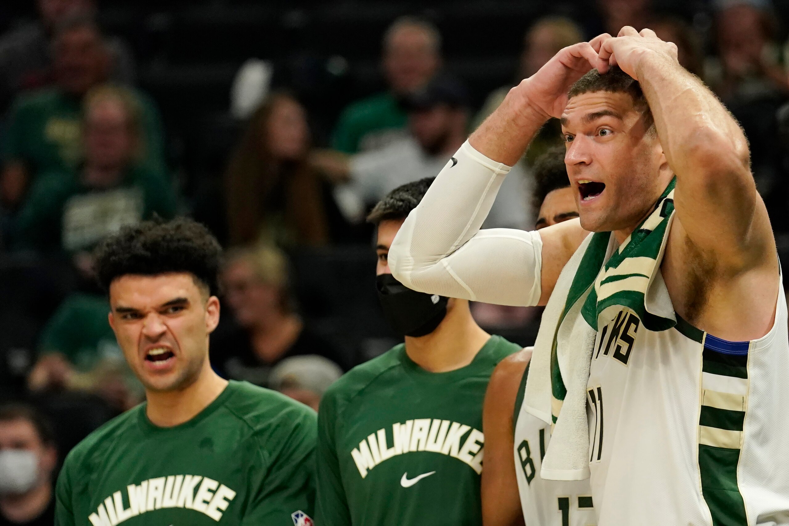 MILWAUKEE, WISCONSIN - OCTOBER 10: Brook Lopez #11 of the Milwaukee Bucks reacts after a basket against the Oklahoma City Thunder in the first half during a preseason game at Fiserv Forum on October 10, 2021 in Milwaukee, Wisconsin. NOTE TO USER: User expressly acknowledges and agrees that, by downloading and or using this photograph, user is consenting to the terms and conditions of the Getty Images License Agreement. (Photo by Patrick McDermott/Getty Images)