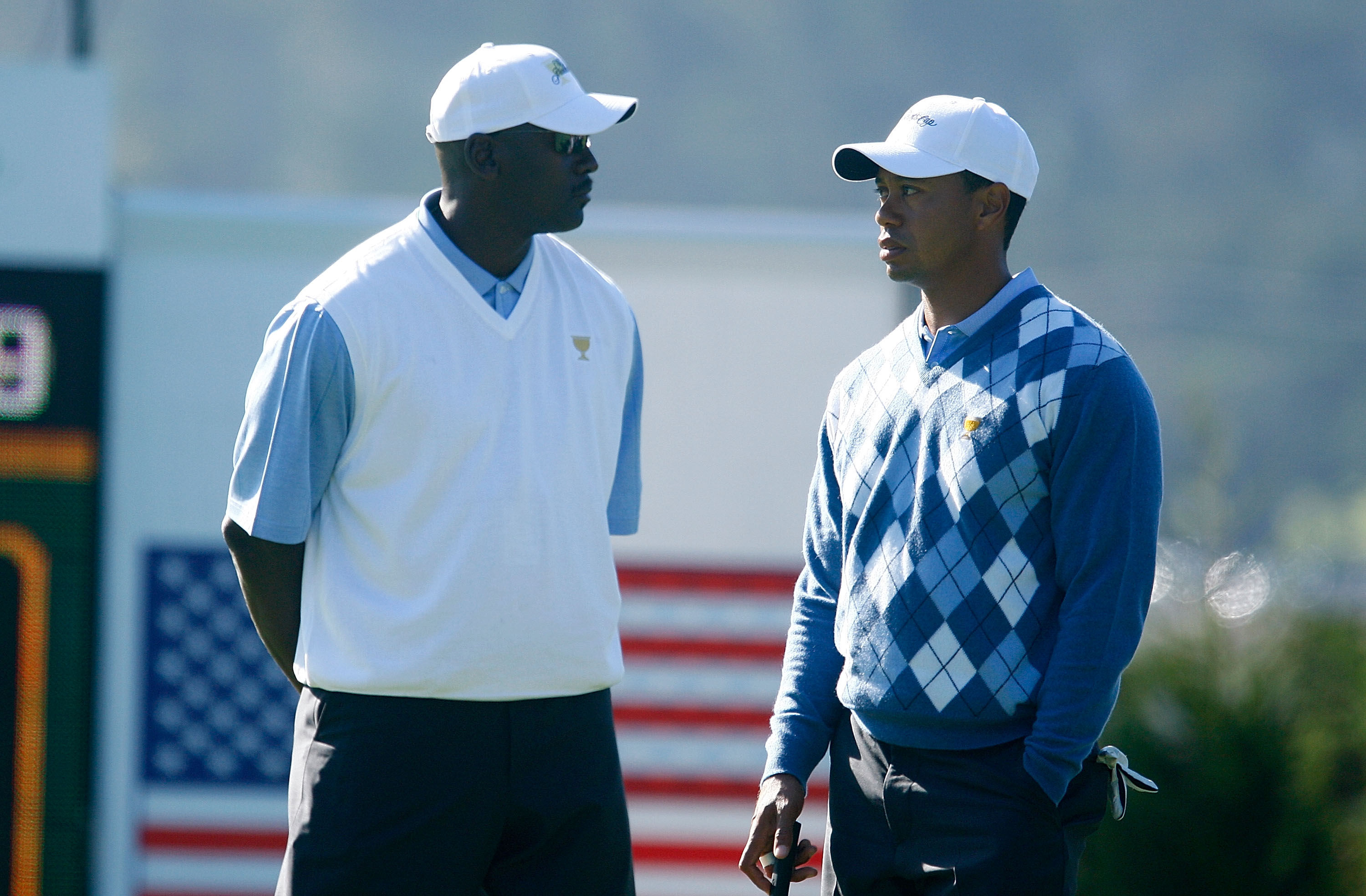 SAN FRANCISCO - OCTOBER 07:  USA Team assistant Michael Jordan chats with Tiger Woods during a practice round prior to the start of The Presidents Cup at Harding Park Golf Course on October 7, 2009 in San Francisco, California.  (Photo by Scott Halleran/Getty Images)