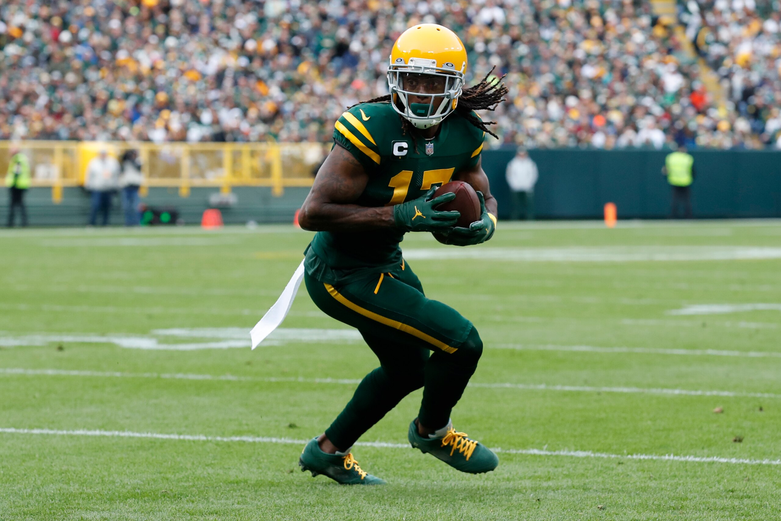 Green Bay Packers wide receiver Davante Adams (17) runs the ball after a catch against the Washington Football Team during an NFL football game Sunday, Oct. 24, 2021, in Green Bay, Wis. (Jeff Haynes/AP Images for Panini)