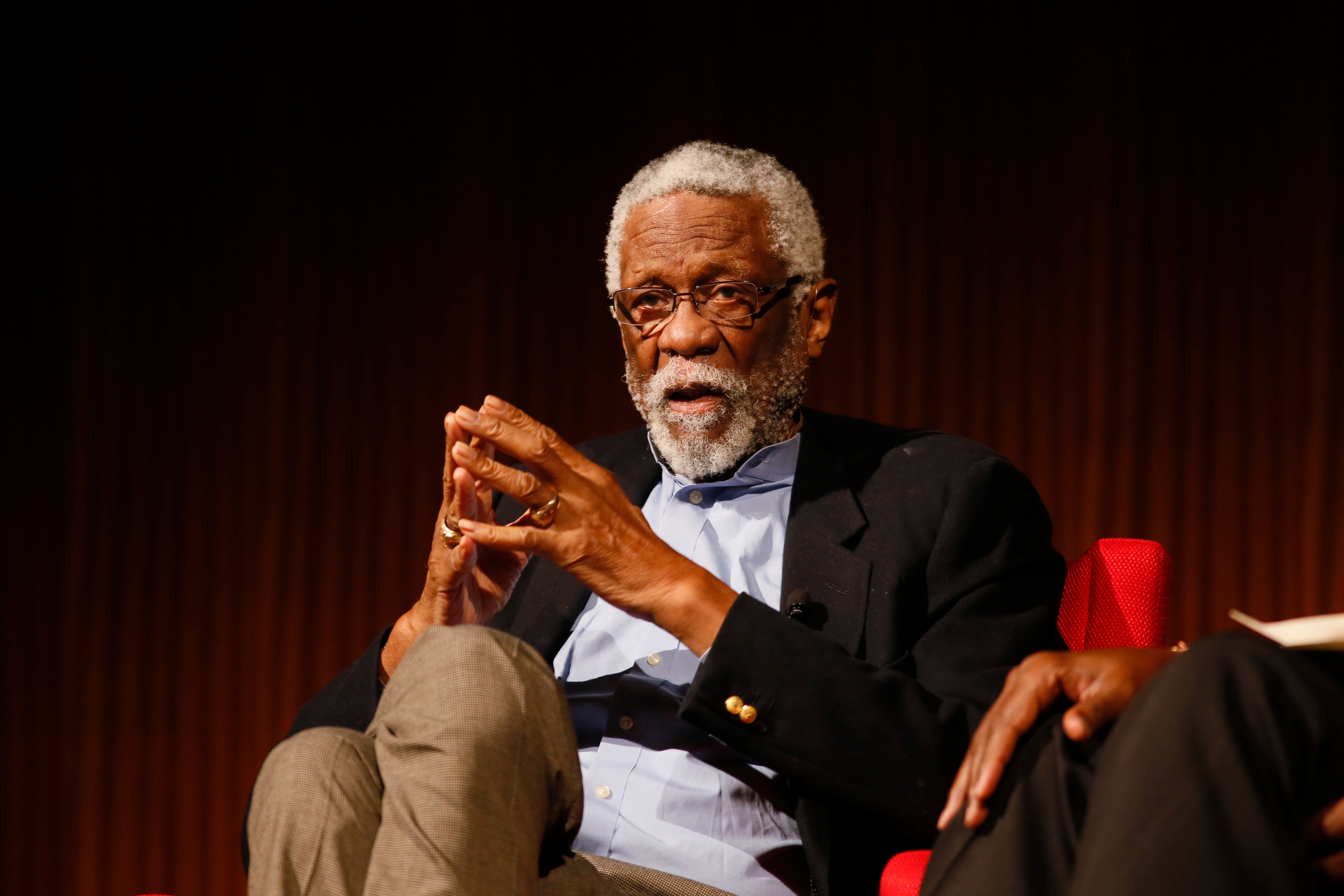 FILE - In this April 9, 2014, file photo, Basketball Hall of Famer Bill Russell takes part in the "Sports and Race: Leveling the Playing Field" panel during the Civil Rights Summit in Austin, Texas. Russell has been released from a Seattle hospital after an overnight stay for an unknown condition. Russell confirmed on Twitter Saturday, May 19, 2018, that he went to the hospital late Friday but does not say why. (AP Photo/Jack Plunkett, File)