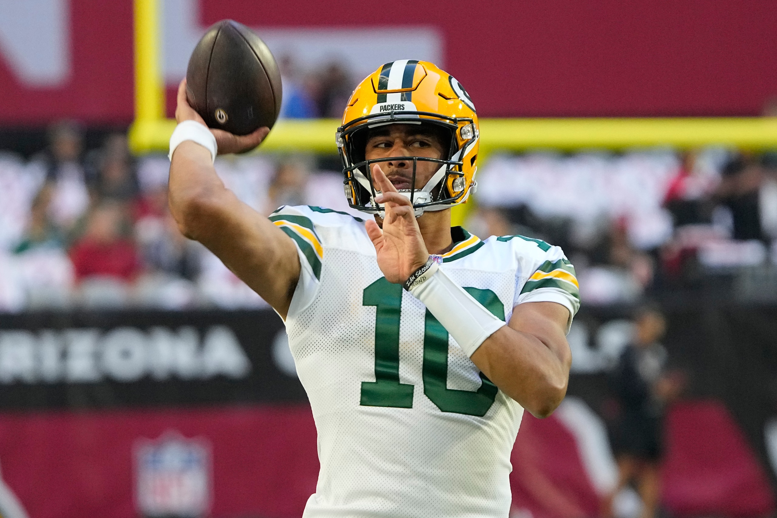Green Bay Packers quarterback Jordan Love (10) warms up prior to an NFL football game against the Arizona Cardinals, Thursday, Oct. 28, 2021, in Glendale, Ariz. (AP Photo/Rick Scuteri)