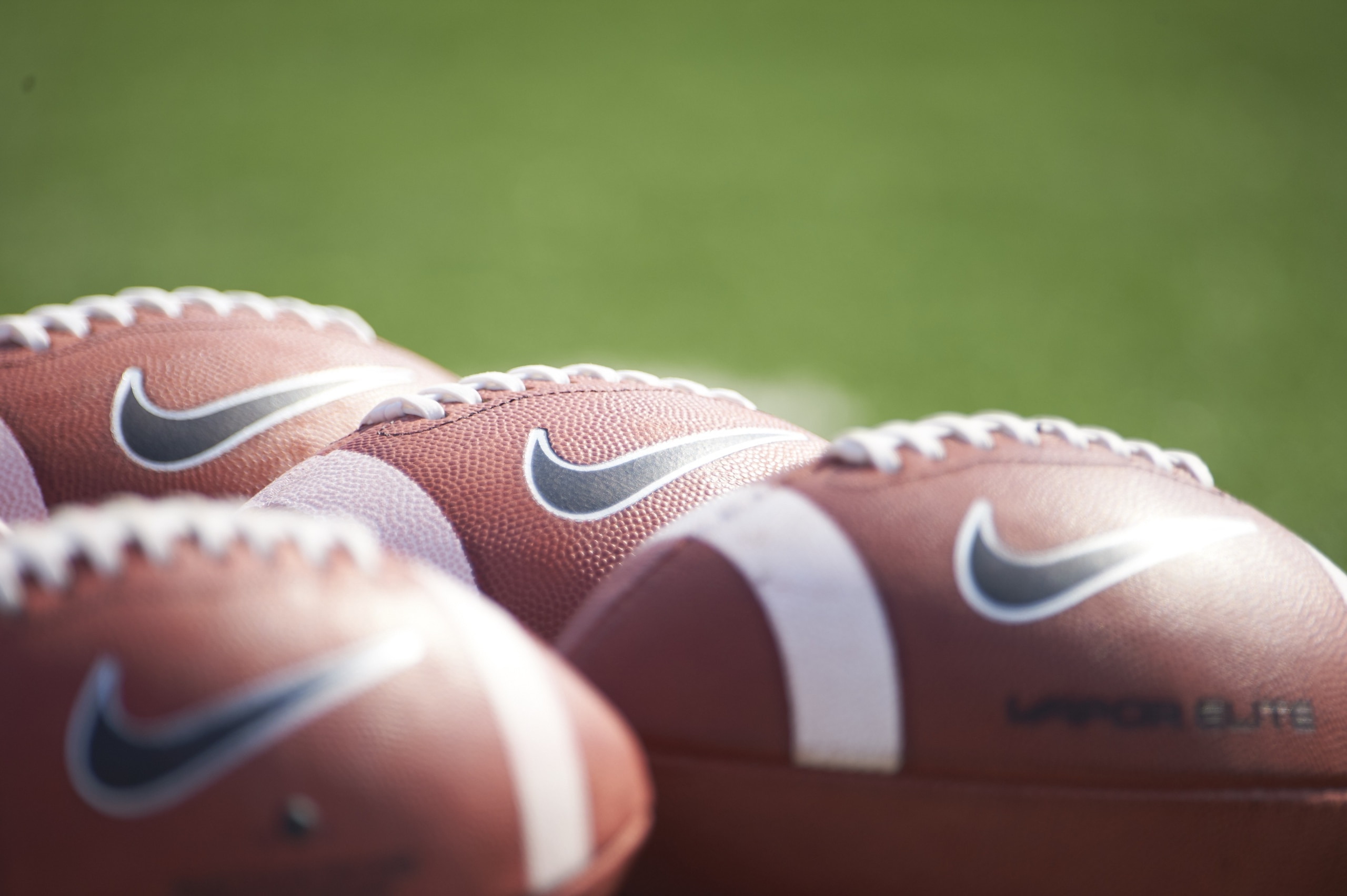 College Football: Closeup of Nike footballs on field before Mississippi vs Tennessee-Martin game at Vaught-Hemingway Stadium. Equipment.
Oxford, MS 9/5/2015
CREDIT: Pouya Dianat (Photo by Pouya Dianat /Sports Illustrated via Getty Images)
(Set Number: X159910 TK1 )