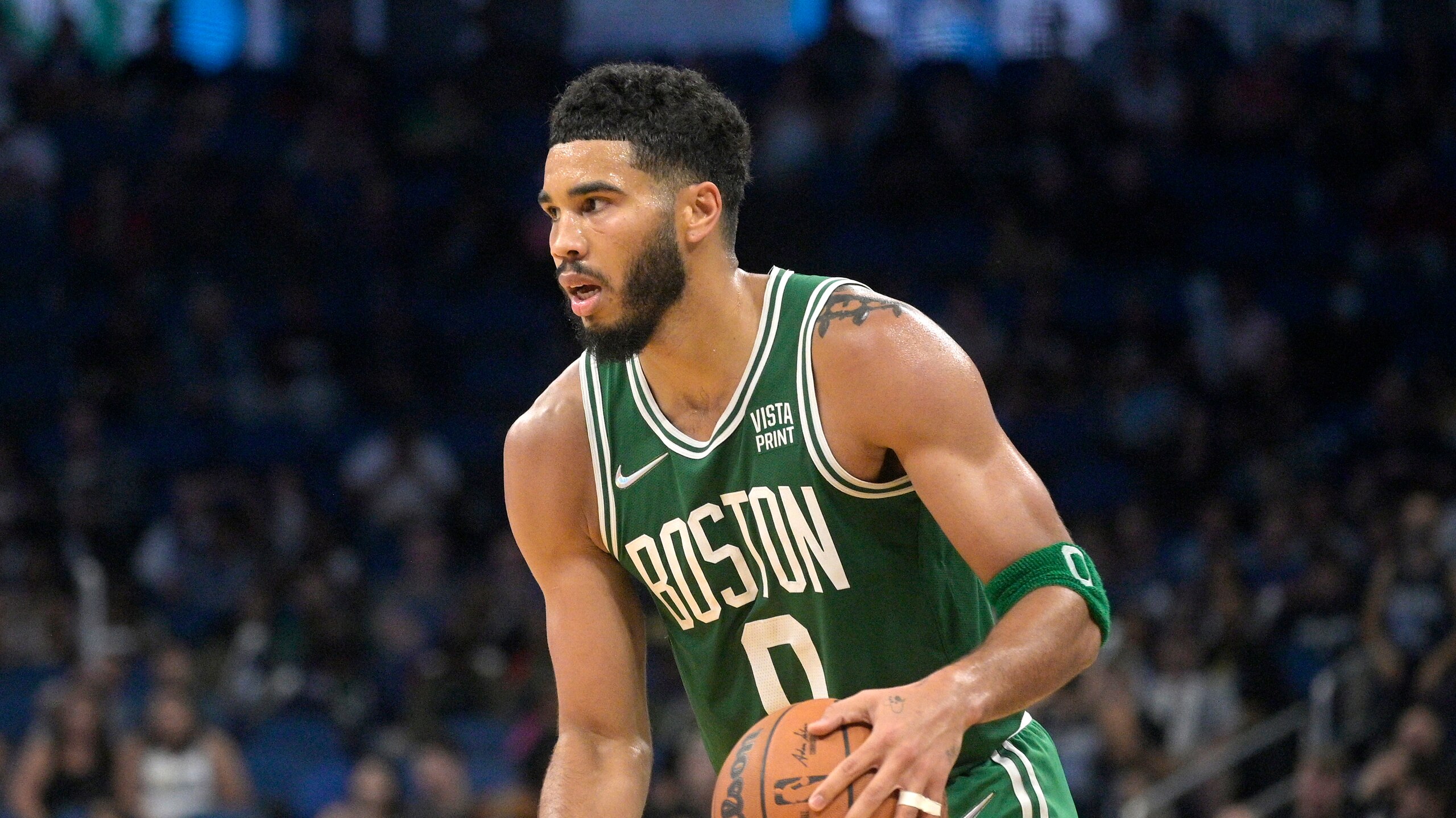 Boston Celtics forward Jayson Tatum (0) sets up a play during the second half of an NBA basketball game against the Orlando Magic, Wednesday, Nov. 3, 2021, in Orlando, Fla. (AP Photo/Phelan M. Ebenhack)