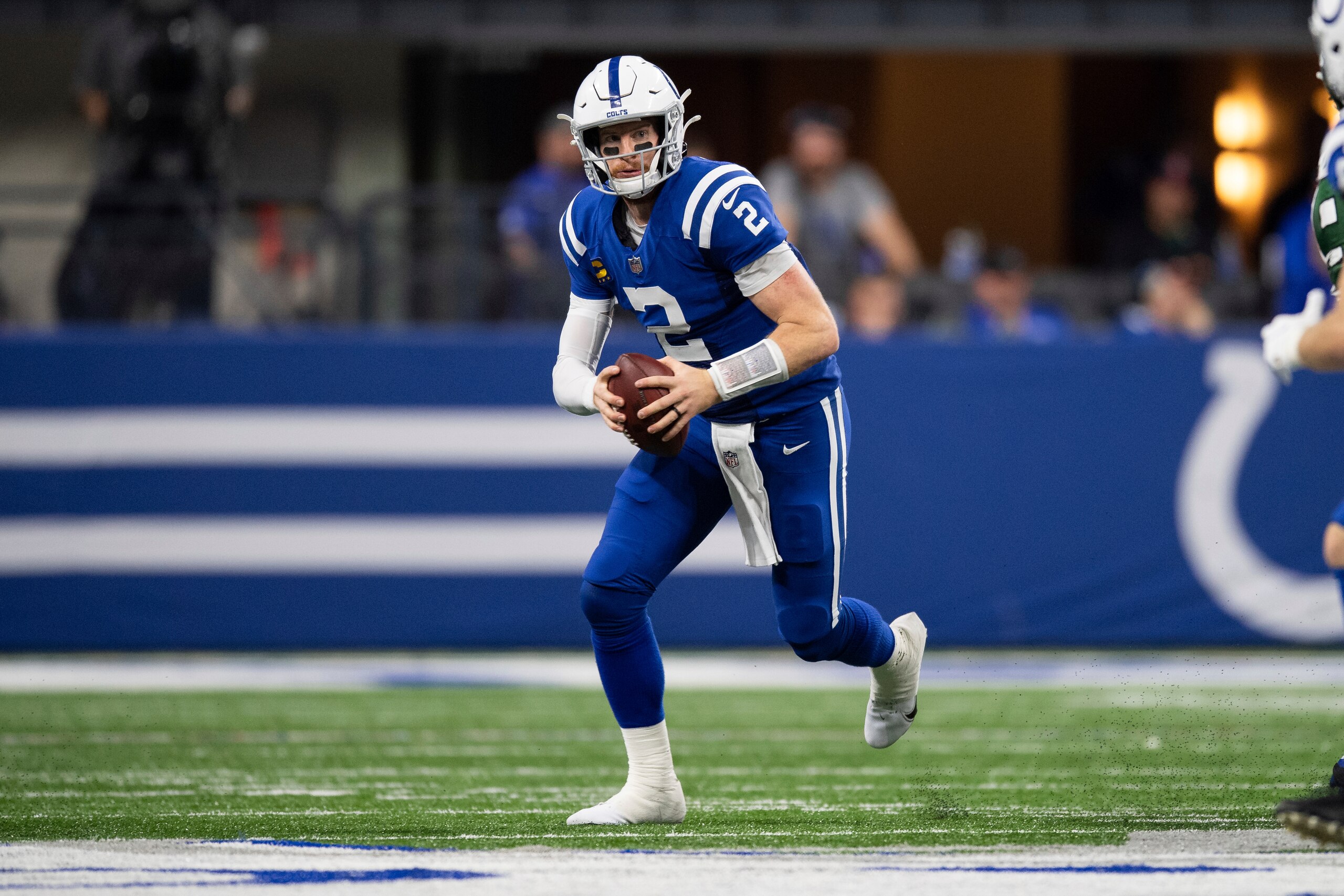 Indianapolis Colts quarterback Carson Wentz (2) scrambles to the outside away from pressure during an NFL football game against the New York Jets, Thursday, Nov. 4, 2021, in Indianapolis. (AP Photo/Zach Bolinger) Indianapolis Colts quarterback Carson Wentz (2) scrambles to the outside away from pressure during an NFL football game against the New York Jets, Thursday, Nov. 4, 2021, in Indianapolis. (AP Photo/Zach Bolinger)