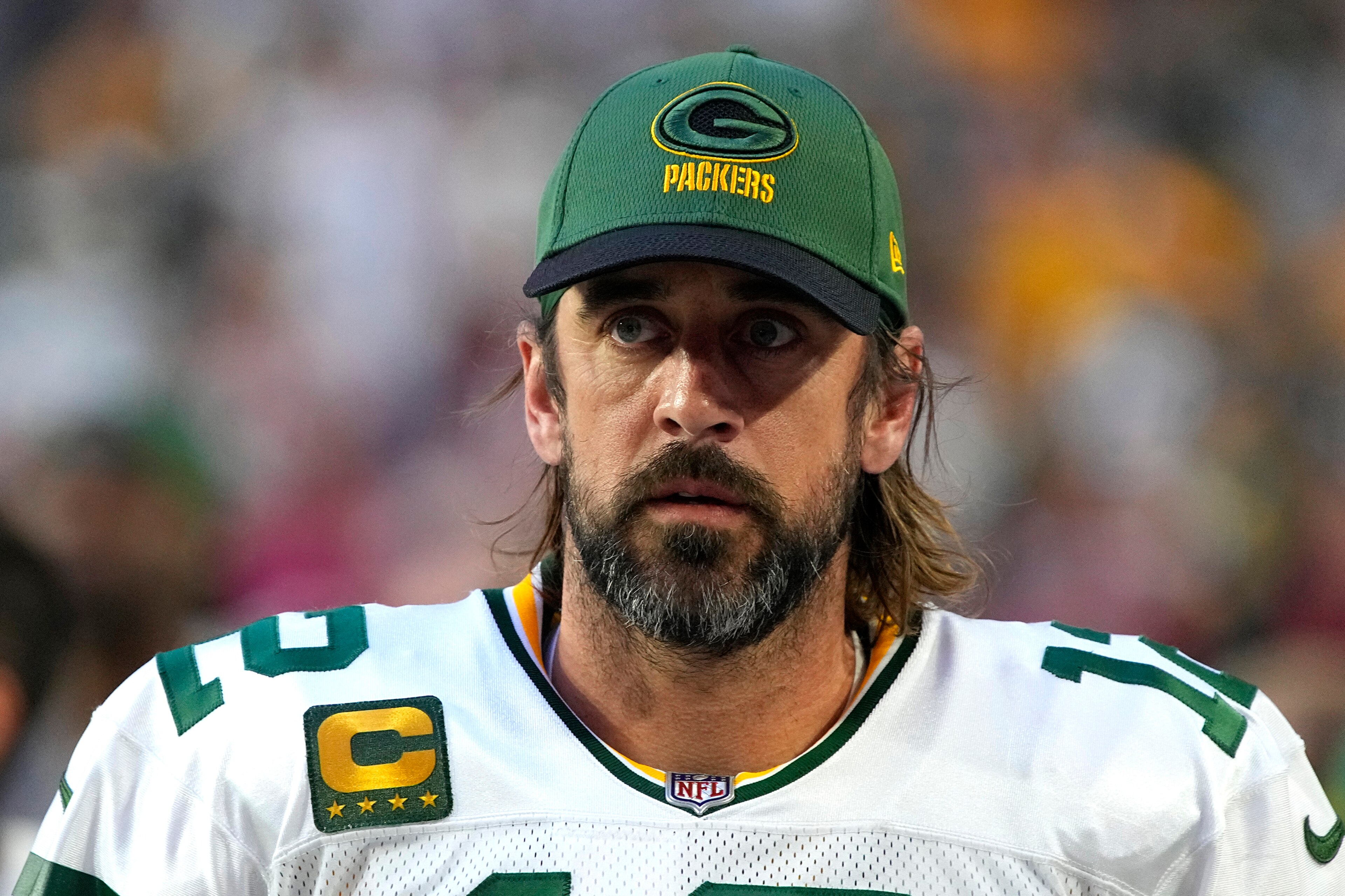 Green Bay Packers quarterback Aaron Rodgers (12) is shown during the first half of an NFL football game against the Arizona Cardinals, Thursday, Oct. 28, 2021, in Glendale, Ariz. Packers quarterback Aaron Rodgers is in the NFL’s COVID-19 protocol and will miss Sunday’s game at Kansas City. Green Bay coach Matt LaFleur confirmed Wednesday, Nov. 3, 2021, that Rodgers was in the protocol, but would not say if Rodgers had tested positive nor if the reigning NFL MVP has been vaccinated. (AP Photo/Rick Scuteri)