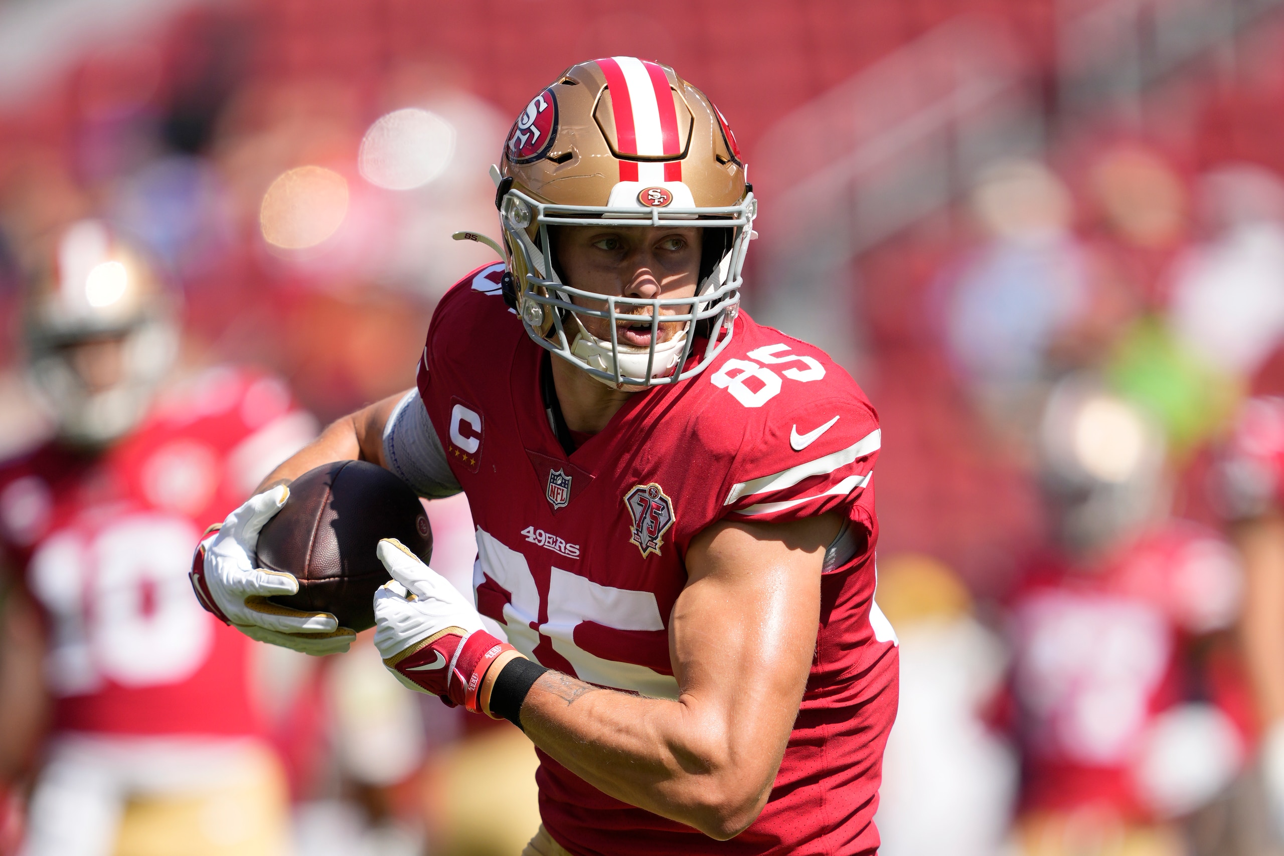 San Francisco 49ers tight end George Kittle (85) warms up before an NFL football game against the Seattle Seahawks in Santa Clara, Calif., Sunday, Oct. 3, 2021. (AP Photo/Tony Avelar)