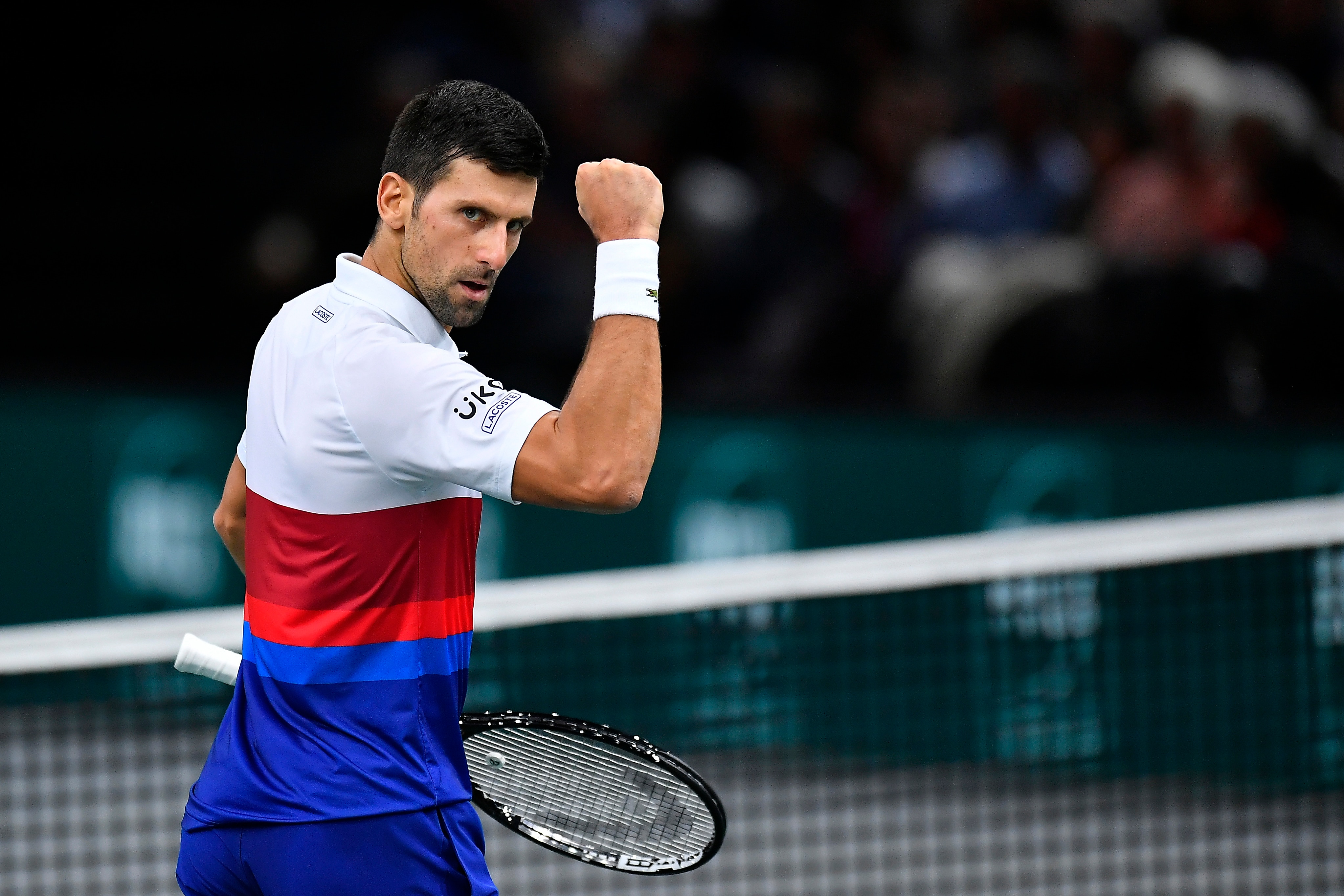 PARIS, FRANCE - NOVEMBER 05: Novak Djokovic of Serbia reacts during his quarterfinal singles match against Taylor Fritz of the United States of America during Day Five of the Rolex Paris Masters at AccorHotels Arena on November 05, 2021 in Paris, France. (Photo by Aurelien Meunier/Getty Images)