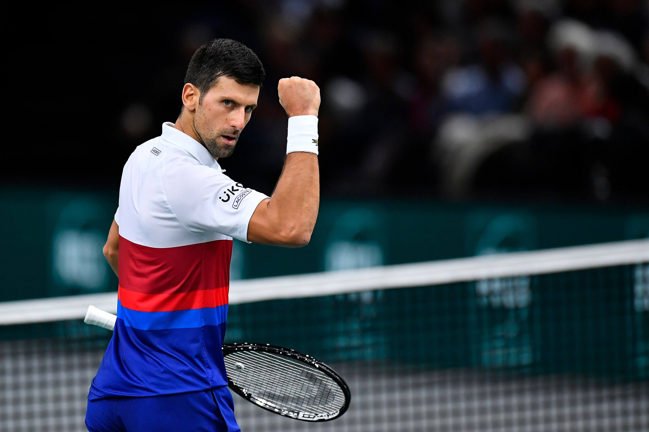 PARIS, FRANCE - NOVEMBER 05: Novak Djokovic of Serbia reacts during his quarterfinal singles match against Taylor Fritz of the United States of America during Day Five of the Rolex Paris Masters at AccorHotels Arena on November 05, 2021 in Paris, France. (Photo by Aurelien Meunier/Getty Images) PARIS, FRANCE - NOVEMBER 05: Novak Djokovic of Serbia reacts during his quarterfinal singles match against Taylor Fritz of the United States of America during Day Five of the Rolex Paris Masters at AccorHotels Arena on November 05, 2021 in Paris, France. (Photo by Aurelien Meunier/Getty Images)
