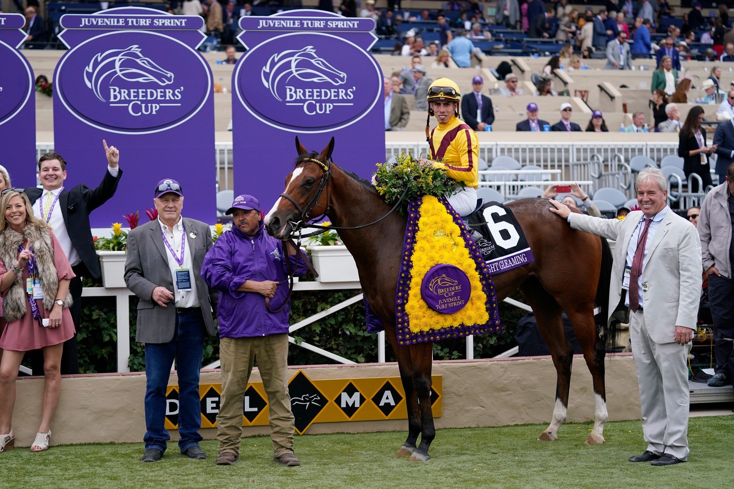Irad Ortiz Jr. celebrates on Twilight Gleaming after winning the Breeders' Cup Juvenile Turf Sprint race at Del Mar in Del Mar, Calif., Friday, Nov. 5, 2021. (AP Photo/Jae C. Hong)