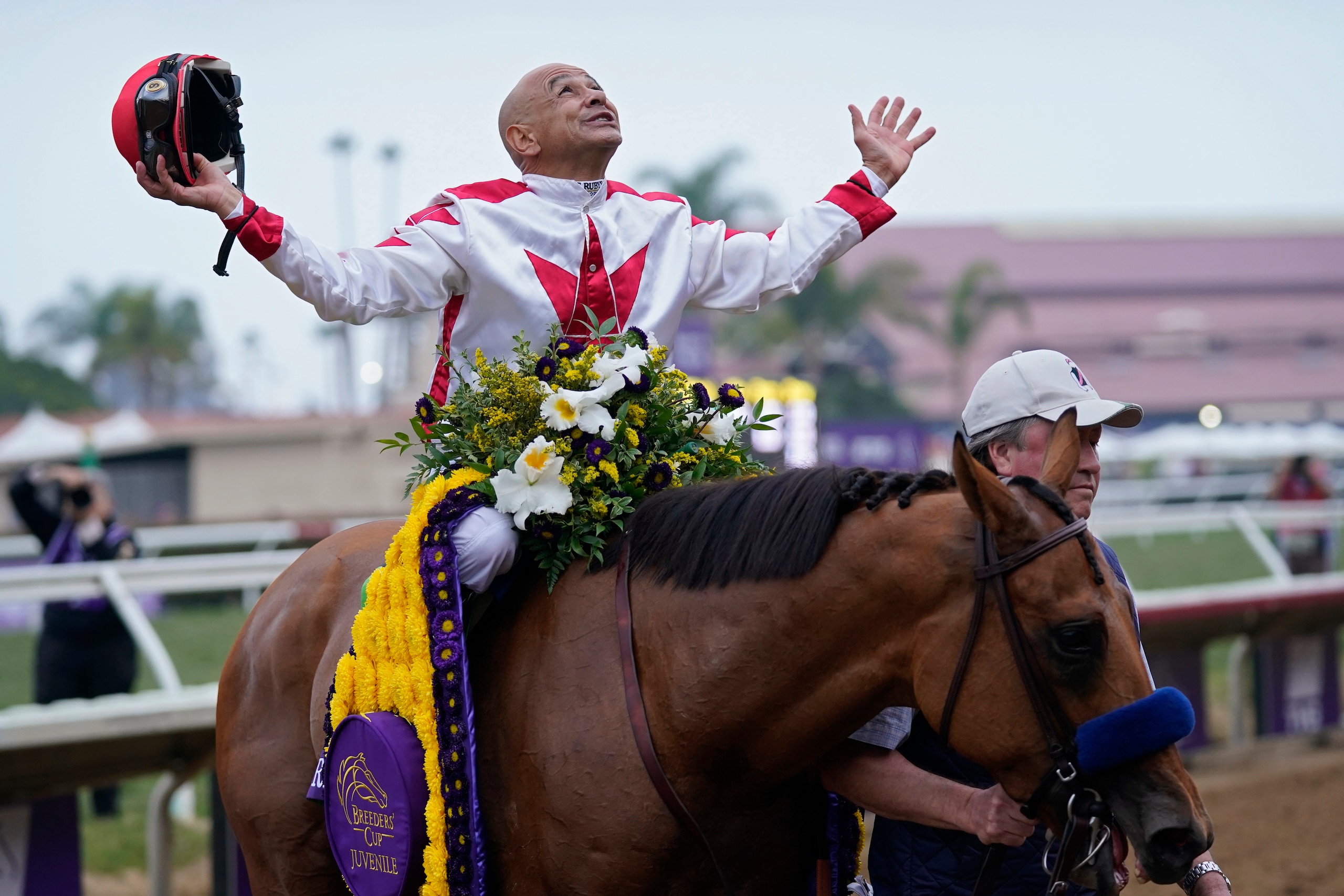 Mike Smith celebrates atop Corniche after winning the Breeders' Cup Juvenile race at the Del Mar racetrack in Del Mar, Calif., Friday, Nov. 5, 2021. (AP Photo/Jae C. Hong)