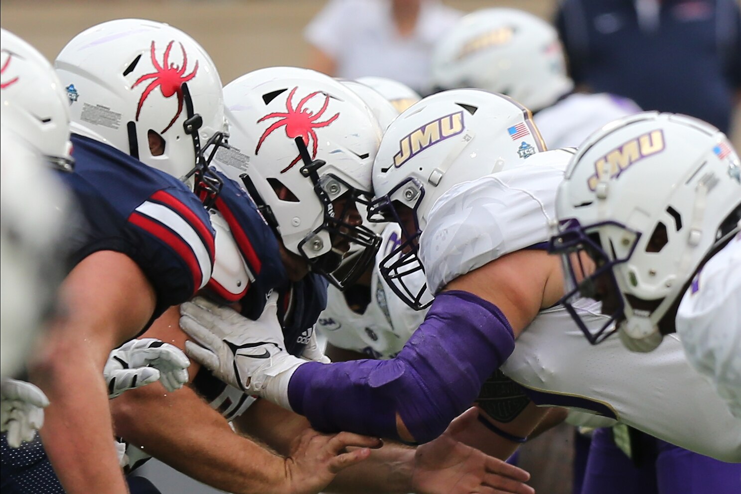 RICHMOND, VA - OCTOBER 16: Richmond Spiders offensive line in the trenches during a game between the James Madison Dukes and the Richmond Spiders on October 16, 2021, at E. Claiborne Robins Stadium in Richmond, VA (Photo by Lee Coleman/Icon Sportswire via Getty Images)