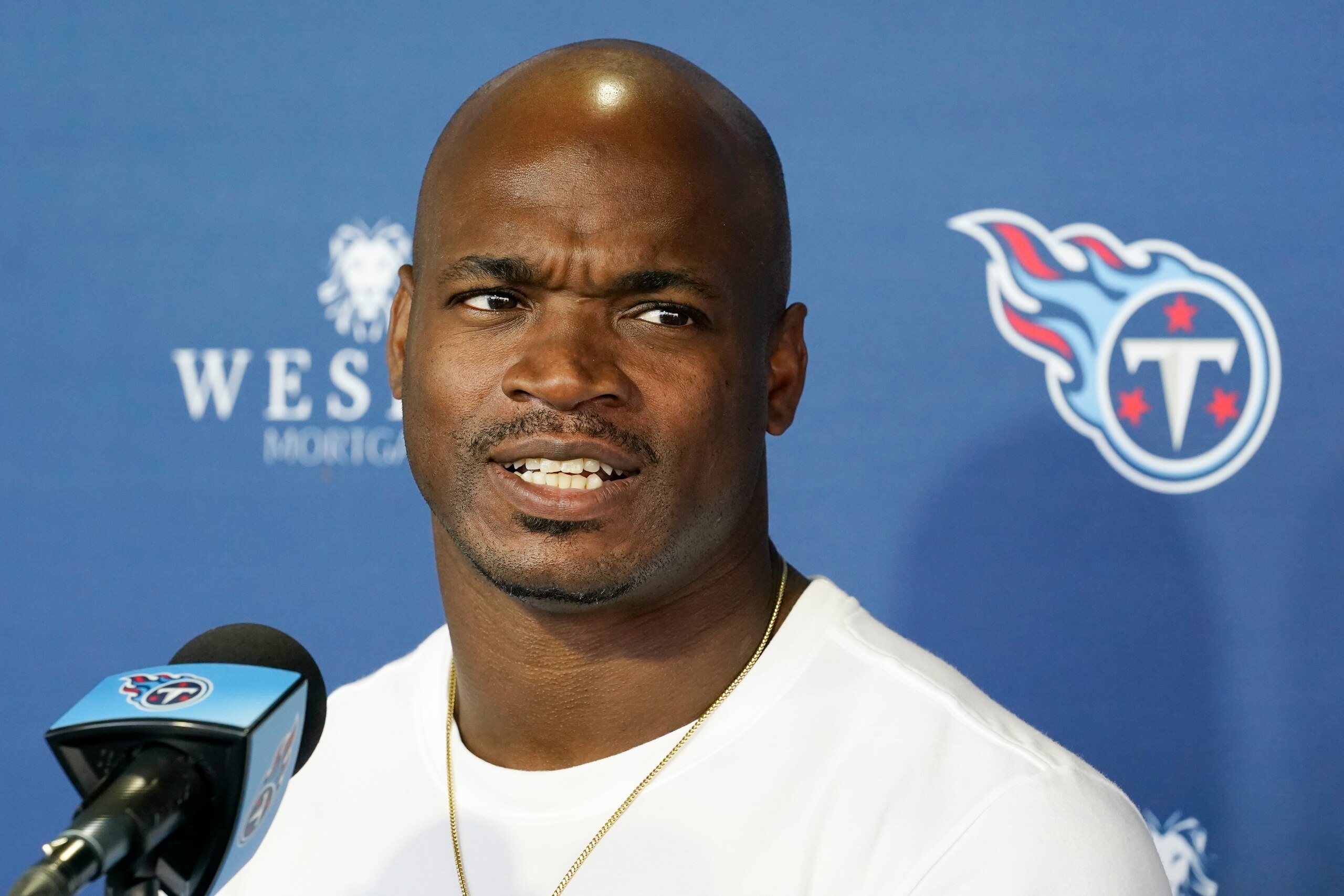 Tennessee Titans running back Adrian Peterson answers questions after an NFL football practice Friday, Nov. 5, 2021, in Nashville, Tenn. The Titans signed the 2012 NFL MVP and four-time All-Pro running back to help replace injured NFL rushing leader Derrick Henry. (AP Photo/Mark Humphrey)