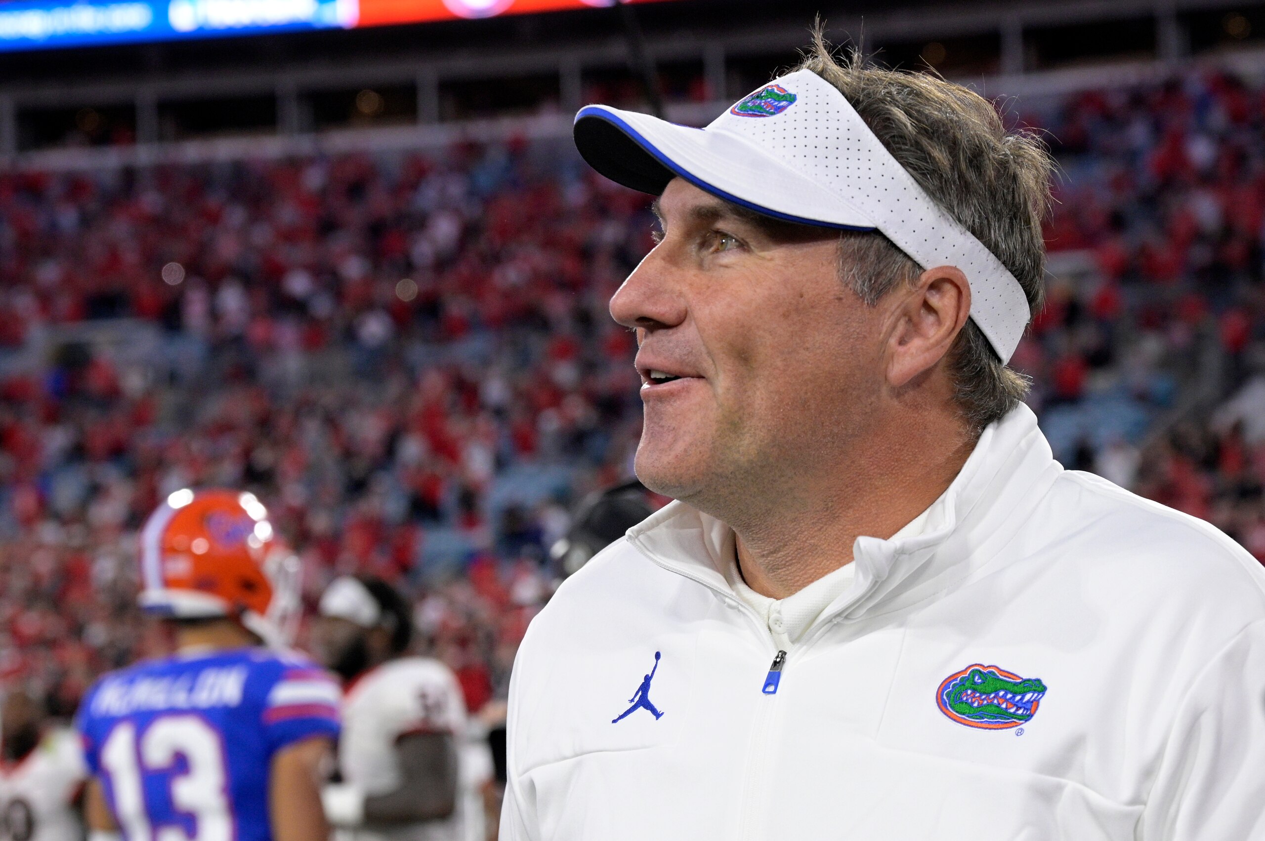 Florida head coach Dan Mullen watches from the sideline during the second half of an NCAA college football game against Georgia, Saturday, Oct. 30, 2021, in Jacksonville, Fla. (AP Photo/Phelan M. Ebenhack)