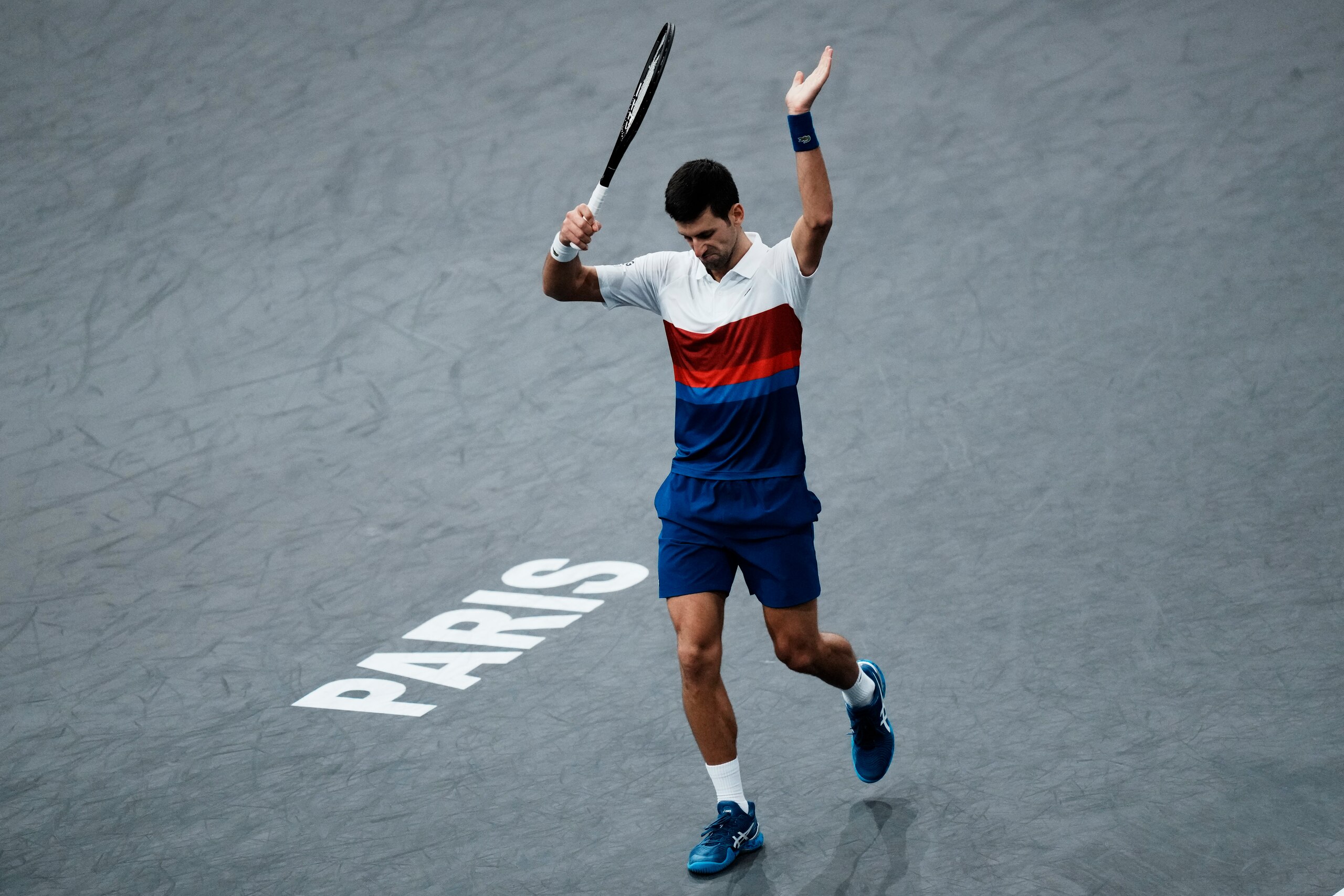 Serbia's Novak Djokovic reacts as he plays Russia's Daniil Medvedev during the final match of the Paris Masters tennis tournament at the Accor Arena in Paris, Sunday, Nov.7, 2021. (AP Photo/Thibault Camus)