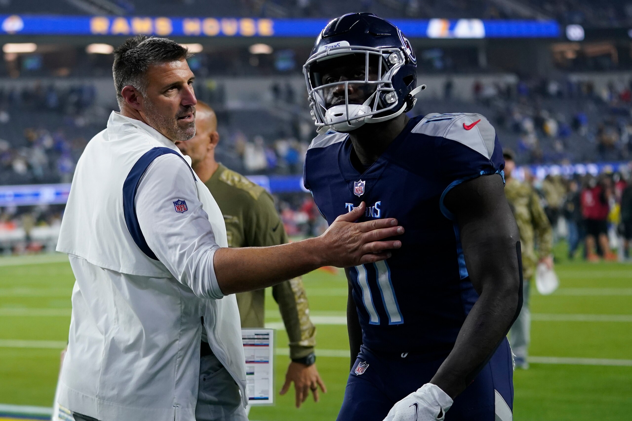 Tennessee Titans head coach Mike Vrabel, left, greets wide receiver A.J. Brown after an NFL football game against the Los Angeles Rams Sunday, Nov. 7, 2021, in Inglewood, Calif. (AP Photo/Ashley Landis)