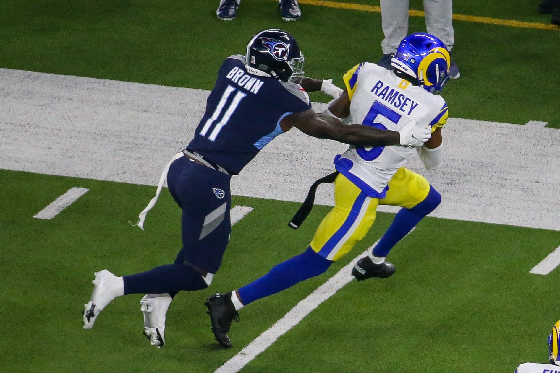 INGLEWOOD, CA - NOVEMBER 7: Los Angeles Rams cornerback Jalen Ramsey #5 intercepts a pass intended for Tennessee Titans wide receiver A.J. Brown #11 during the Tennessee Titans game versus Los Angeles Rams game on Sunday November 7, 2021 at Sofi Stadium in Inglewood, CA. (Photo by Jevone Moore/Icon Sportswire via Getty Images)