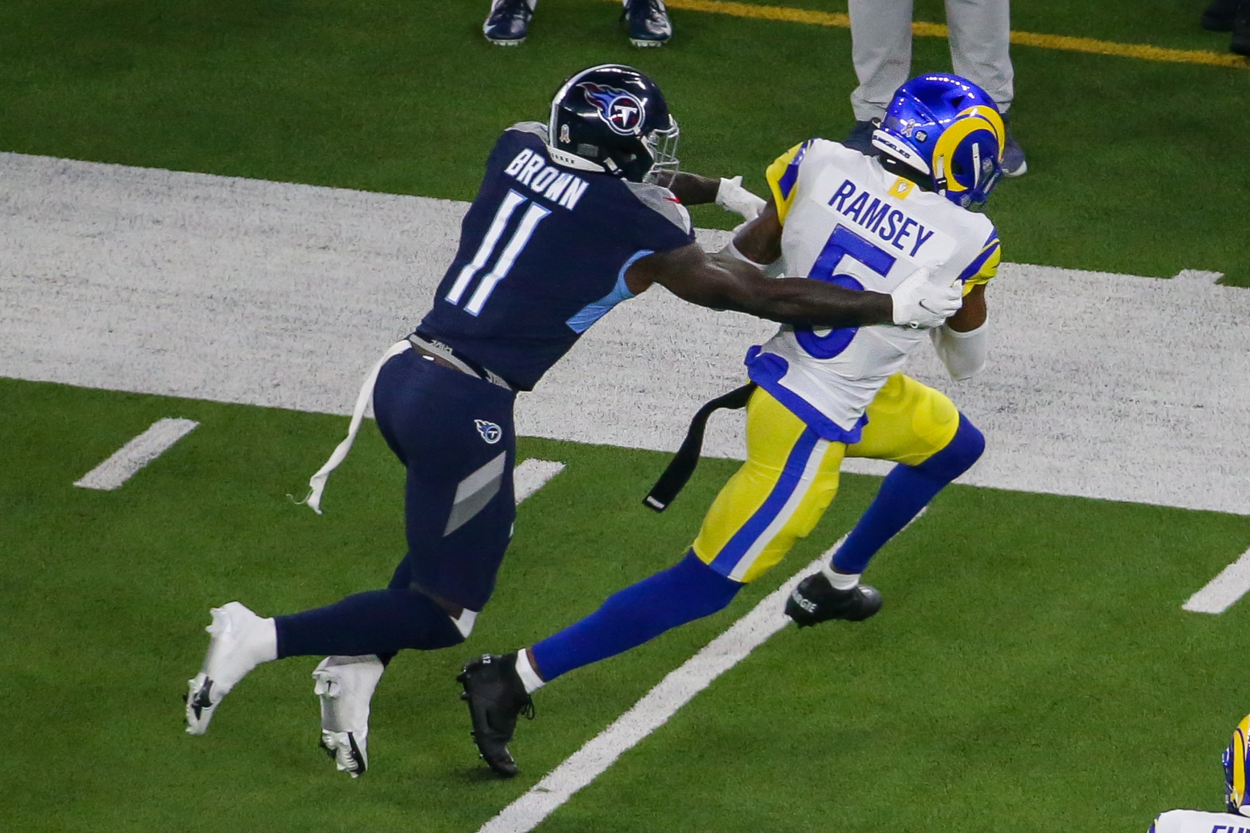 INGLEWOOD, CA - NOVEMBER 7: Los Angeles Rams cornerback Jalen Ramsey #5 intercepts a pass intended for Tennessee Titans wide receiver A.J. Brown #11 during the Tennessee Titans game versus Los Angeles Rams game on Sunday November 7, 2021 at Sofi Stadium in Inglewood, CA. (Photo by Jevone Moore/Icon Sportswire via Getty Images)