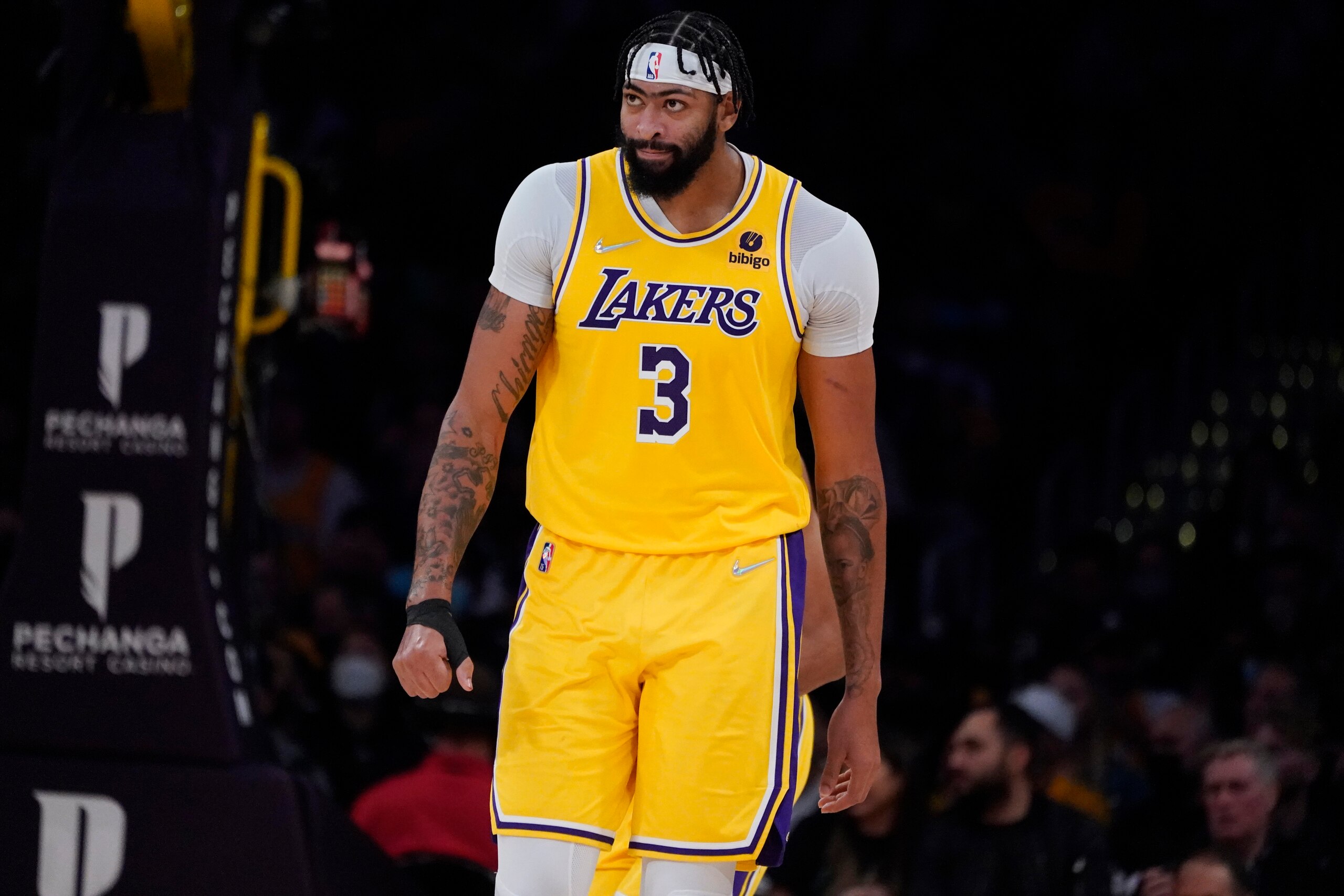 Los Angeles Lakers forward Anthony Davis (3) walks back to the defensive side during the second half of an NBA basketball game against the Oklahoma City Thunder Thursday, Nov. 4, 2021, in Los Angeles. (AP Photo/Marcio Jose Sanchez)