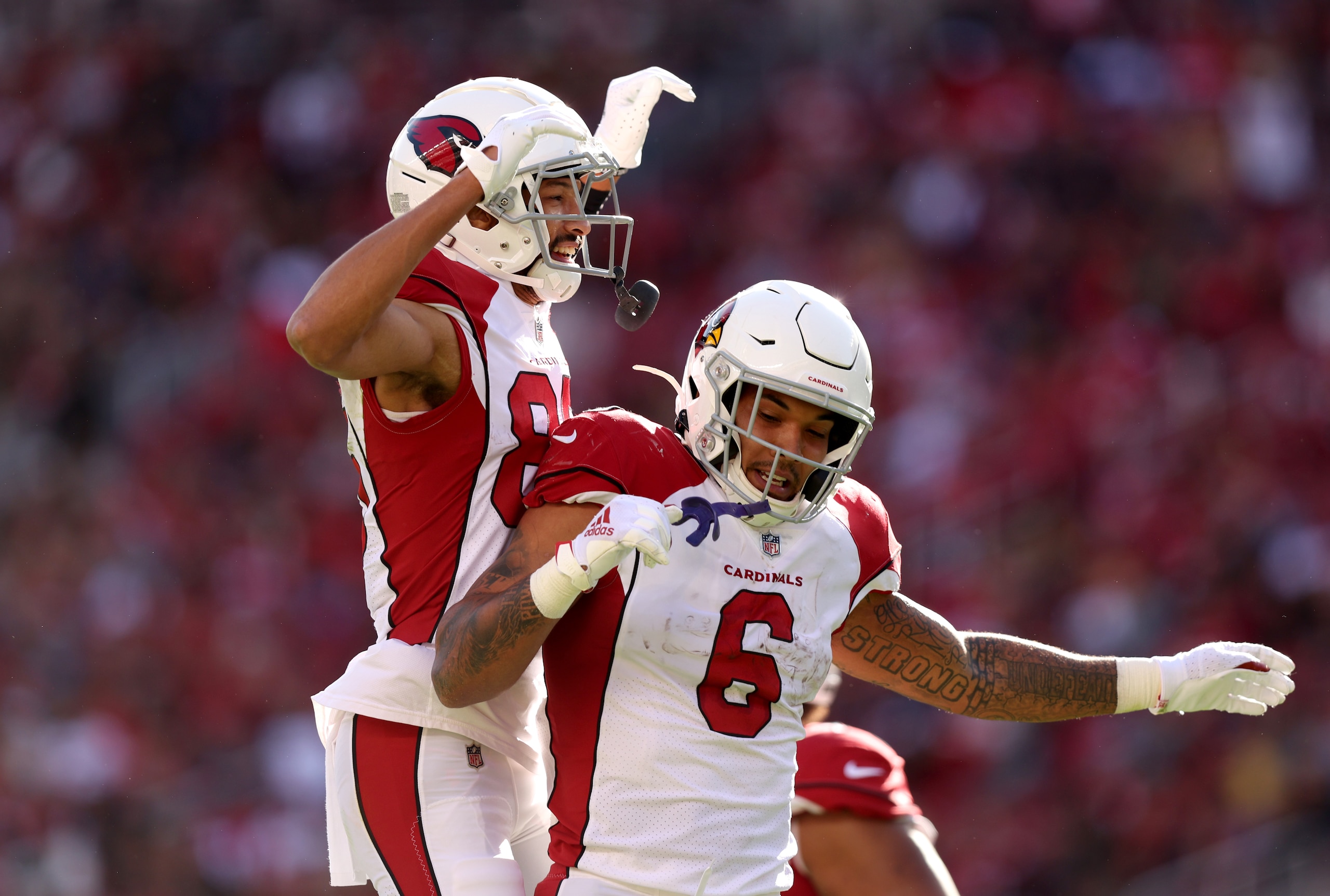 SANTA CLARA, CALIFORNIA - NOVEMBER 07: James Conner #6 of the Arizona Cardinals celebrates with Antoine Wesley #85 after running for a touchdown during the first quarter against the San Francisco 49ers at Levi's Stadium on November 07, 2021 in Santa Clara, California. (Photo by Ezra Shaw/Getty Images)