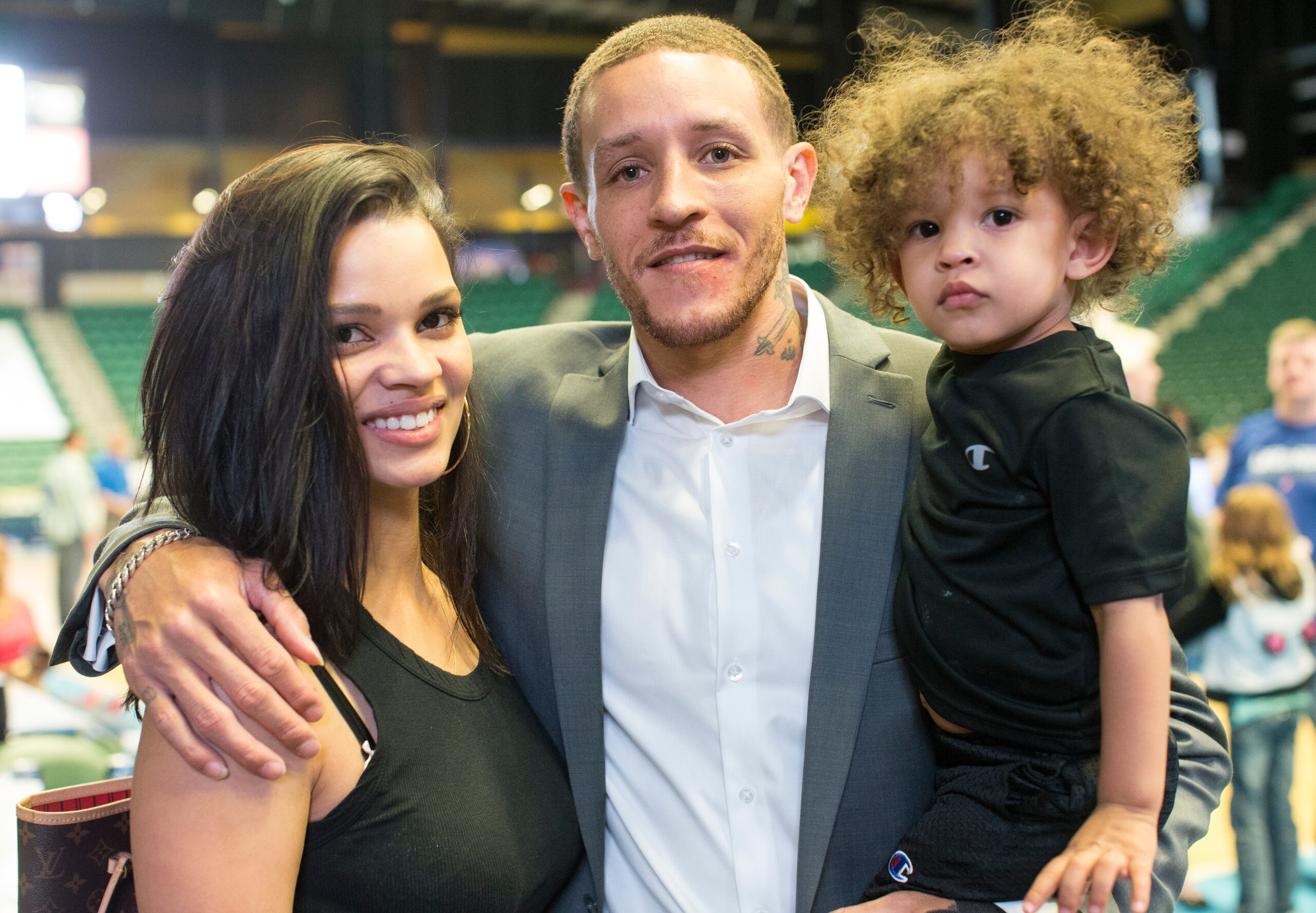 Frisco, TX- April 1: Texas Legends basketball player Delonte West with his wife Caressa and son Cash pose for a photo at the Dr. Pepper Arena on April 1, 2015 in Frisco, Texas.  West is currently on the disabled list with the Frisco, Texas D-League team Texas Legends.  He has a wrist injury on his left hand.  West has had an interesting career path in the NBA and hopes to again play on an NBA team.  (Photo by Michael Mulvey for The Washington Post via Getty Images)